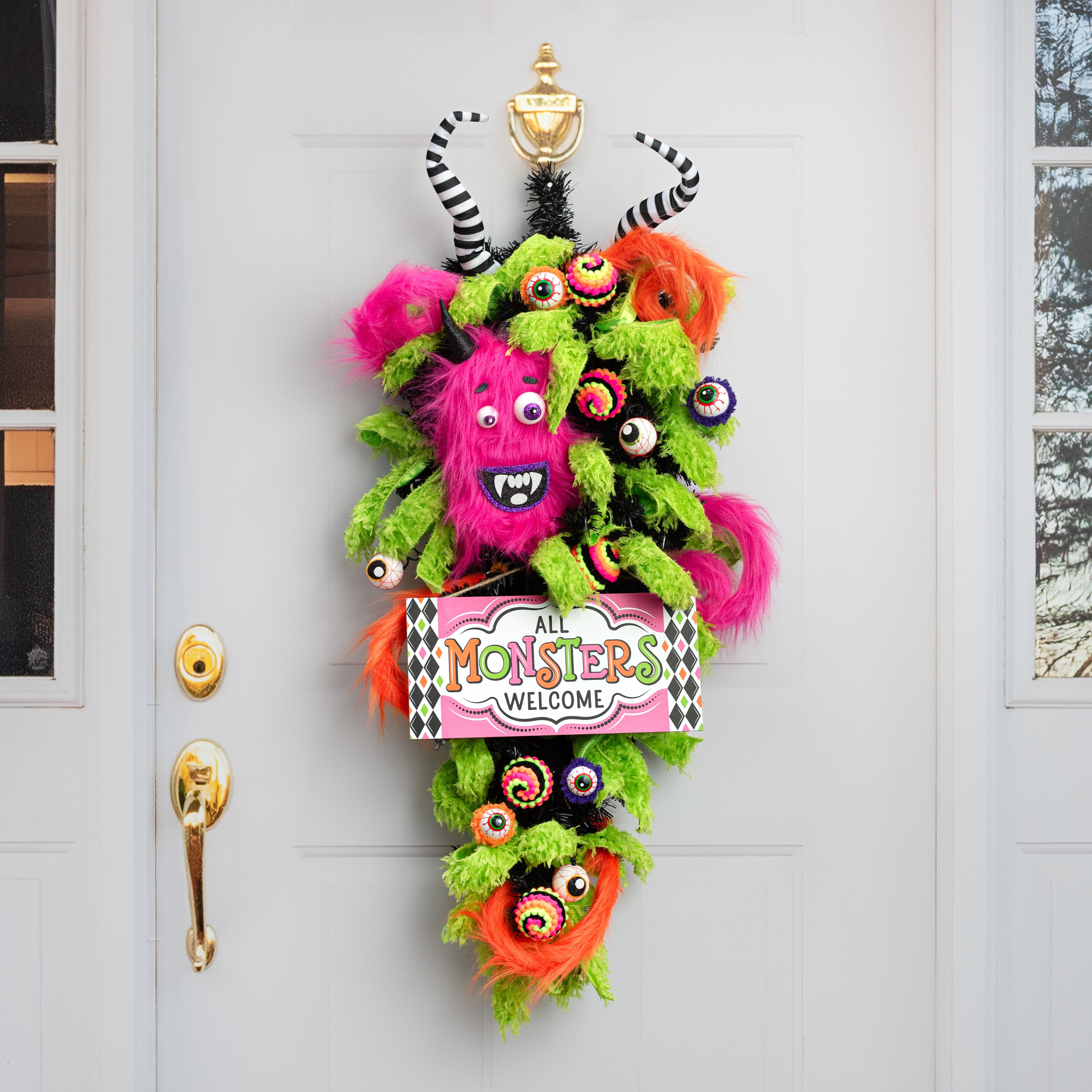 12" Wooden Sign: All Monsters Welcome Pink Lifestyle Photo