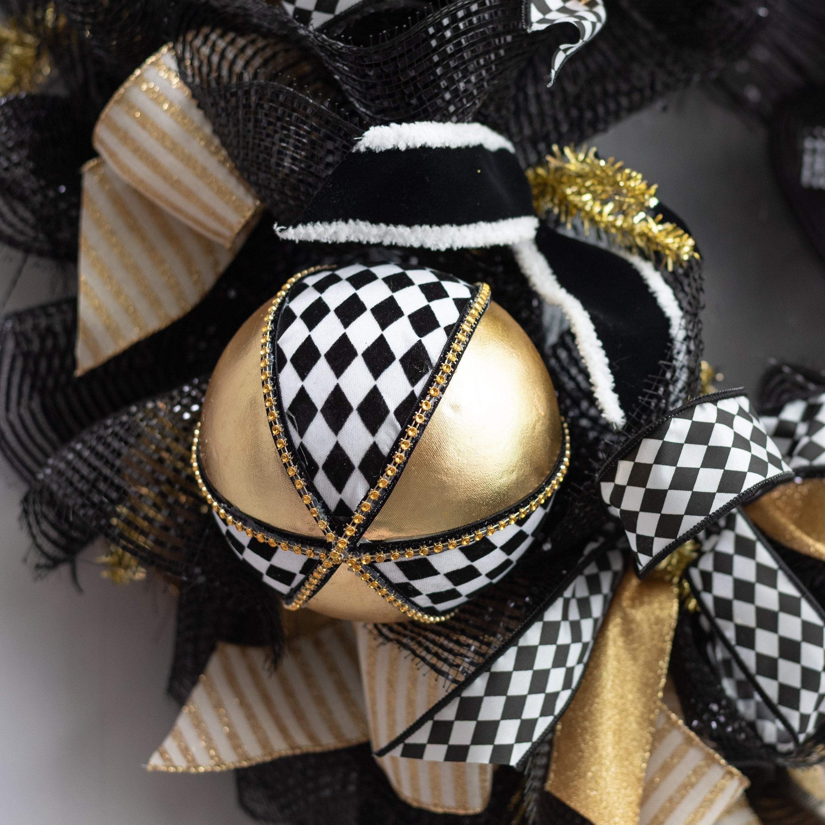 120mm Metallic Harlequin Diamond Ball Ornament: Gold, Black & White Lifestyle Photo