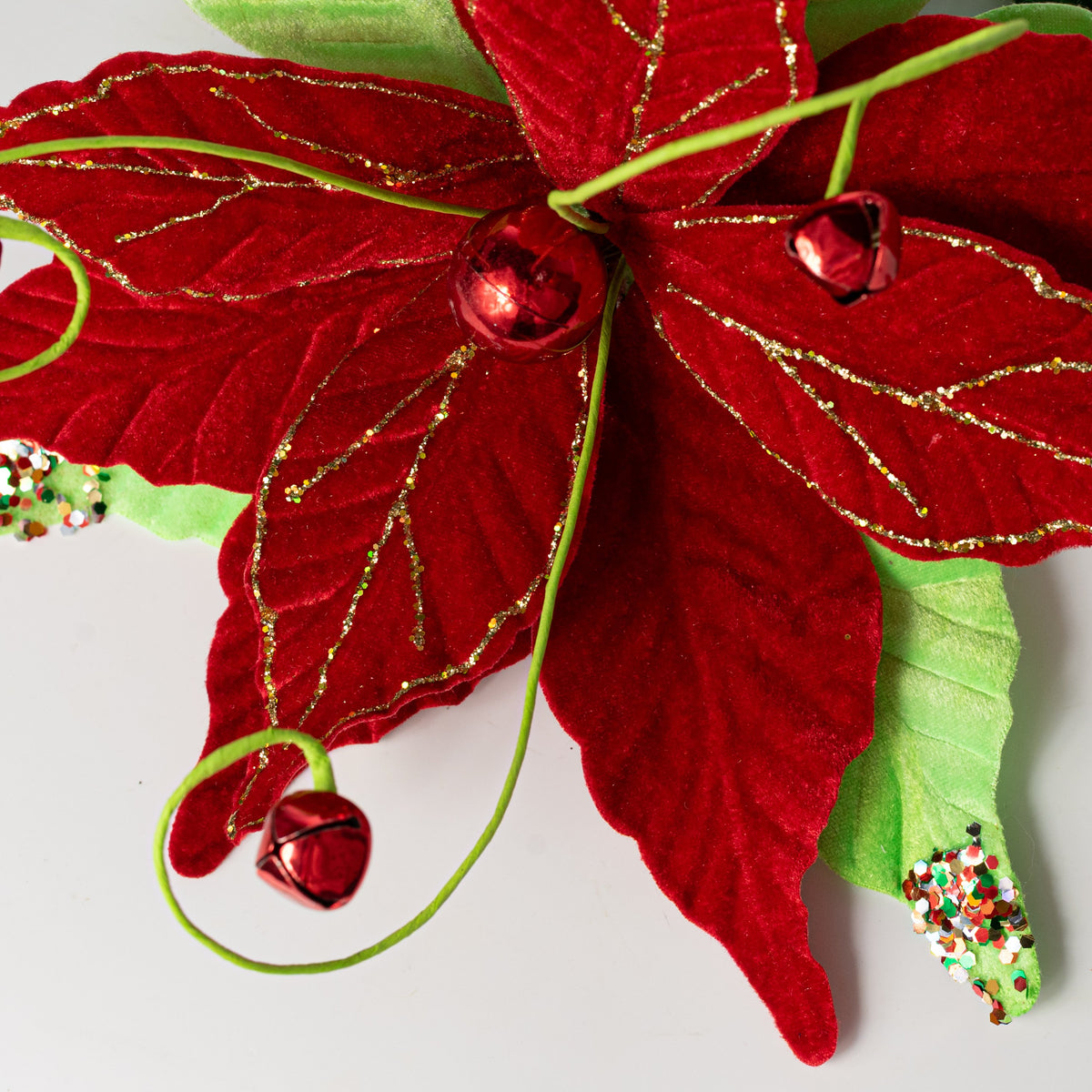 15" Glittered Velvet Poinsettia Spray: Red & Bright Green Lifestyle Photo