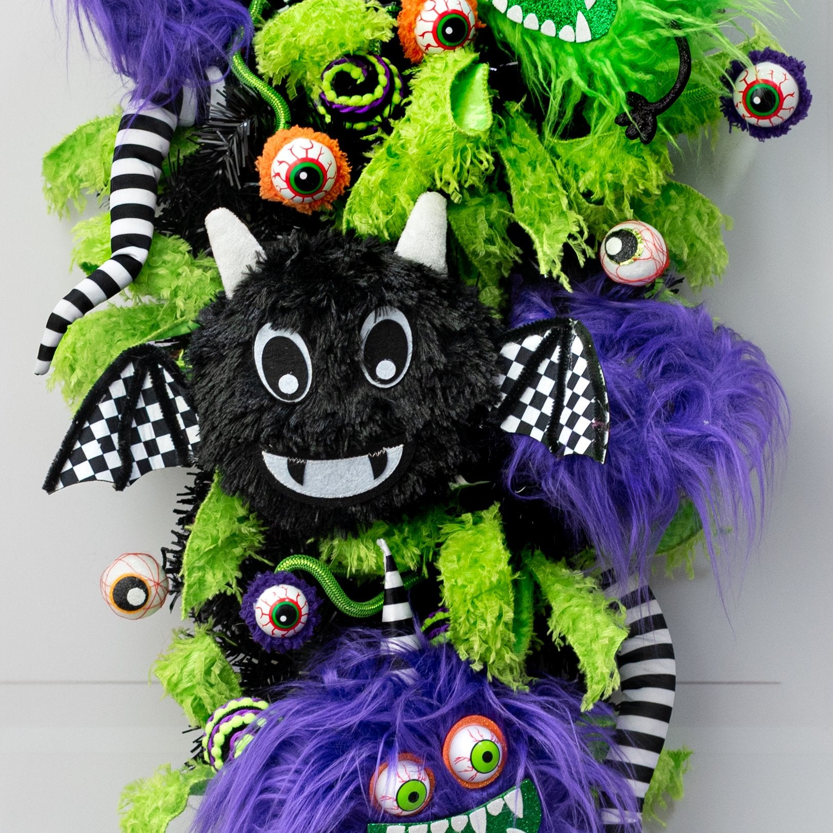 16" Fuzzy Bat Wreath Enhancement: Black & White Check Lifestyle Photo