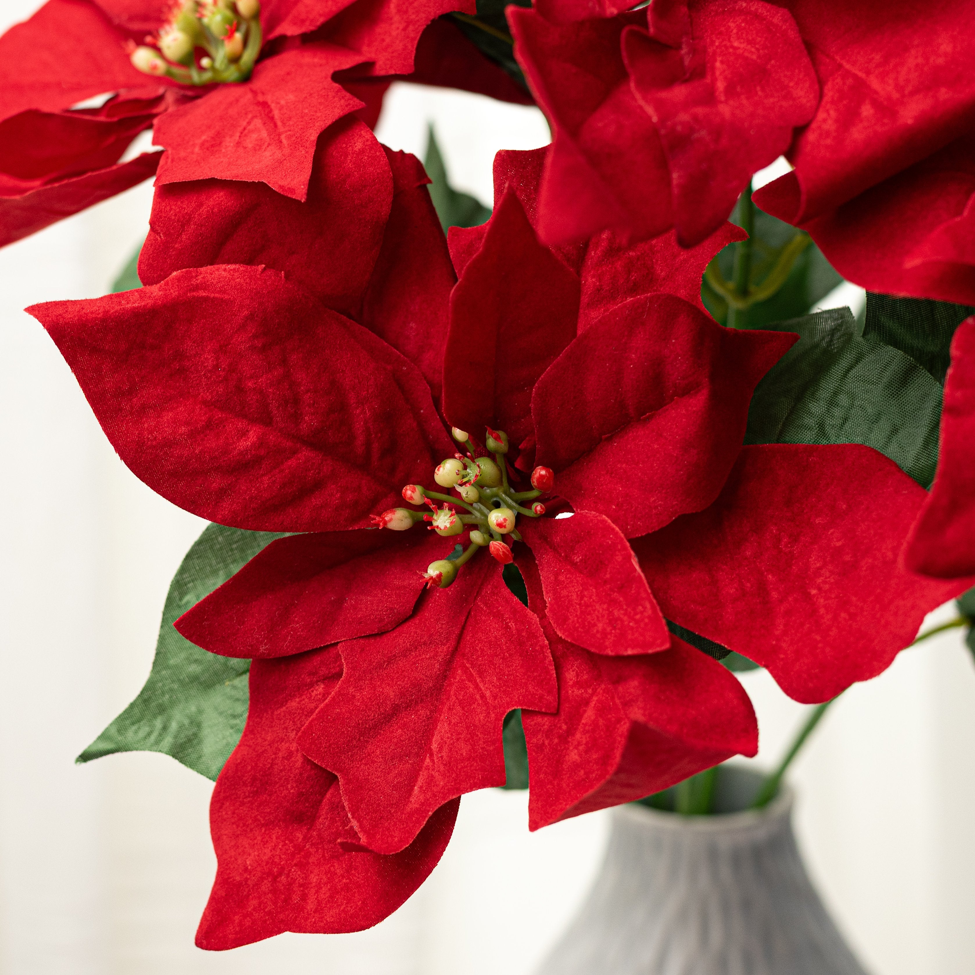 18" Artificial Poinsettia Bush: Red (7 Stem) Lifestyle Photo