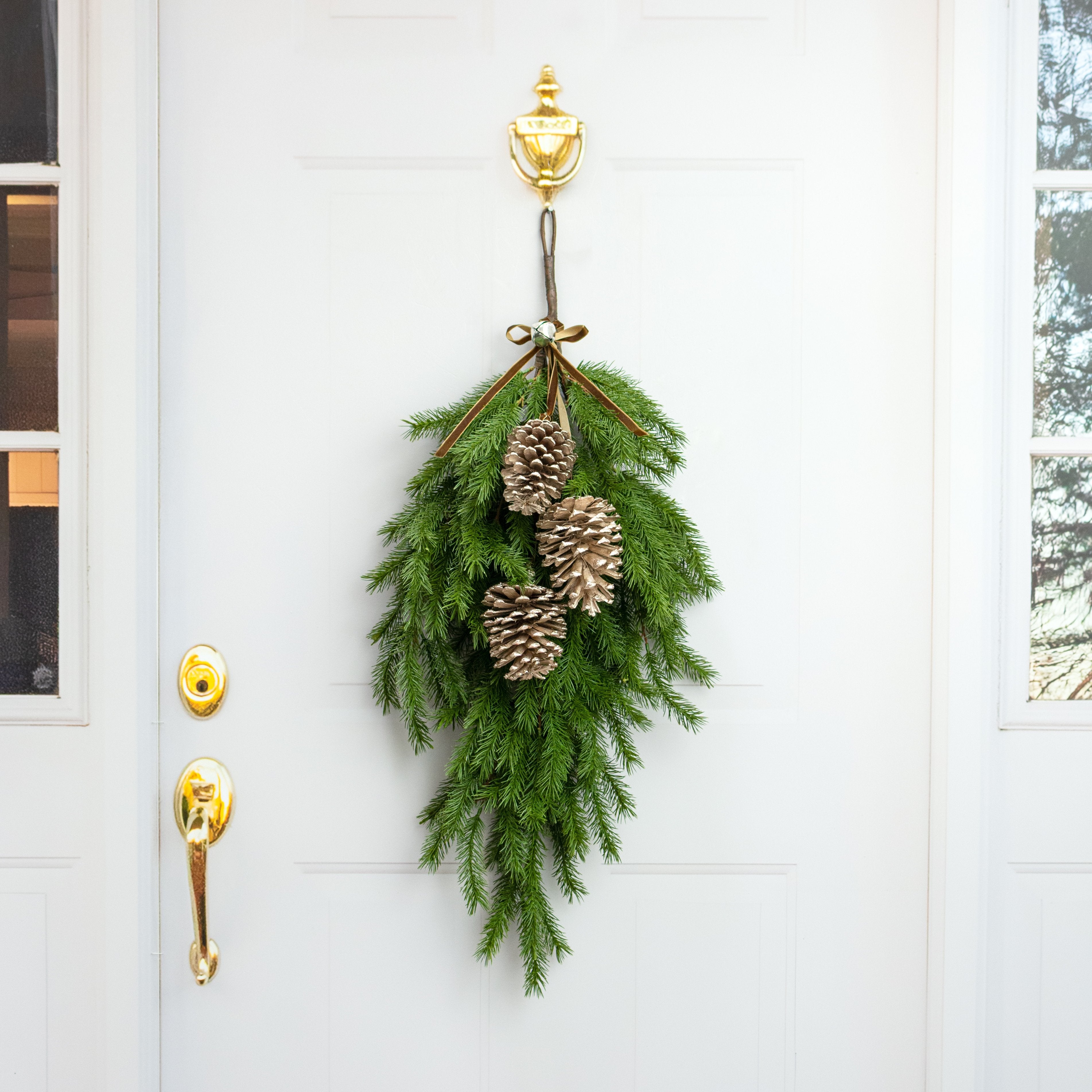 18" Hanging Pinecone Cluster: Champagne Glitter Lifestyle Photo