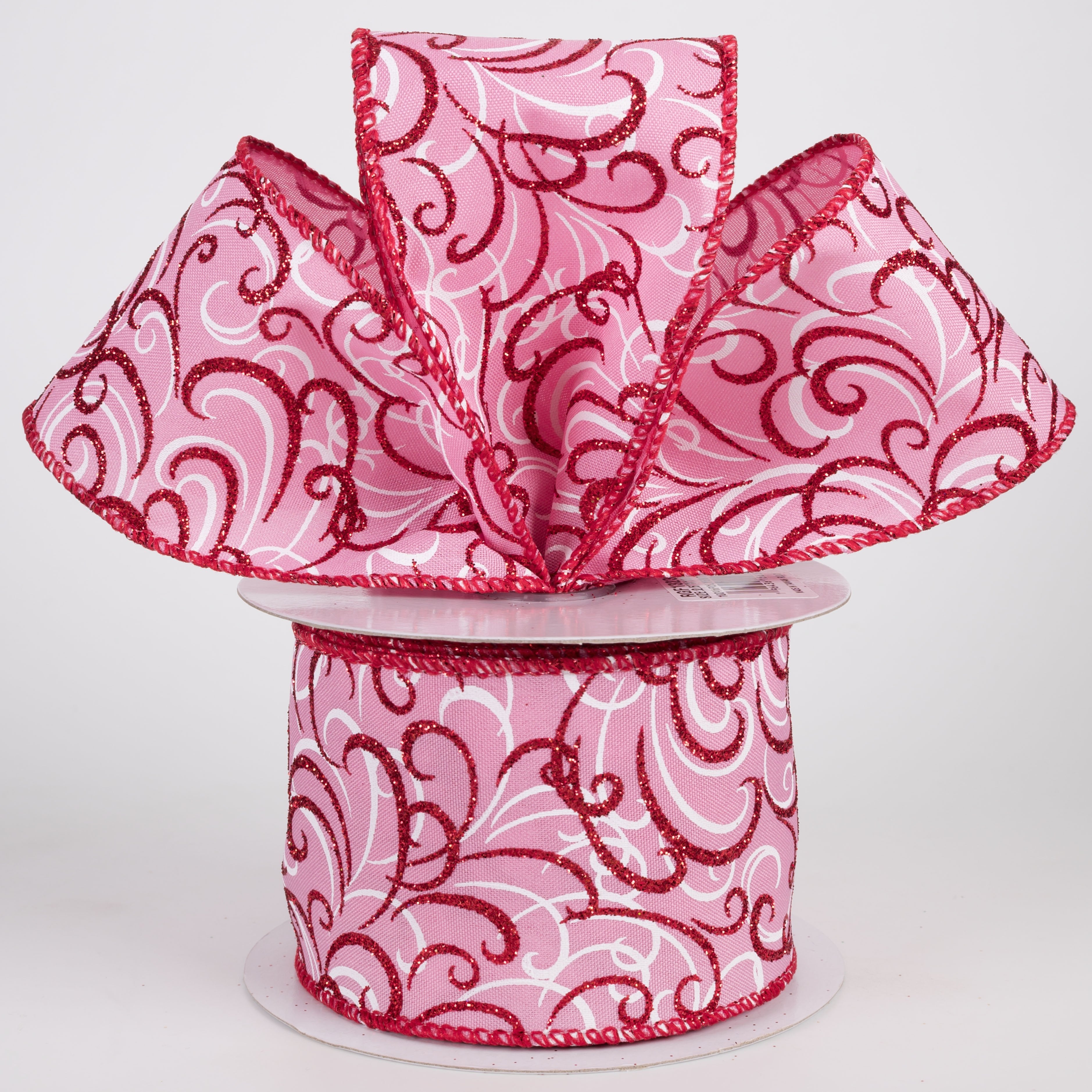 2.5" Glittered Multi Swirls Ribbon: Red & White on Pink (10 Yards) Lifestyle Photo