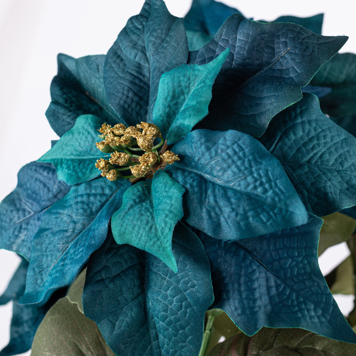 20" Artificial Poinsettia Bush: Teal Blue (5 Stem) Lifestyle Photo