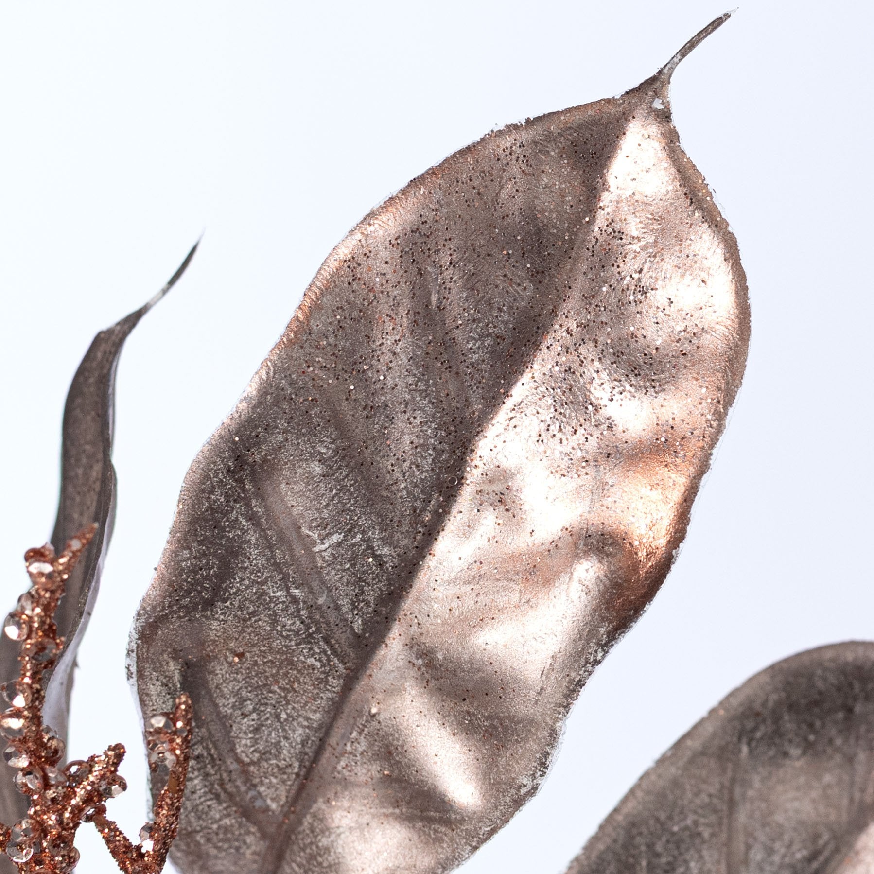 24" Metallic Magnolia Leaves & Twigs Spray: Rose Gold Lifestyle Photo