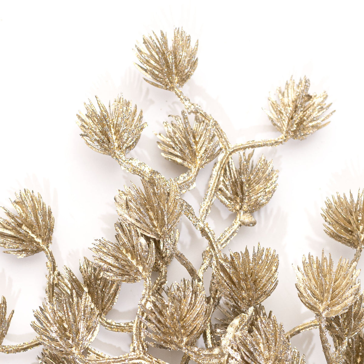 25" Glittered Mini Pine Spray: Champagne Gold Lifestyle Photo