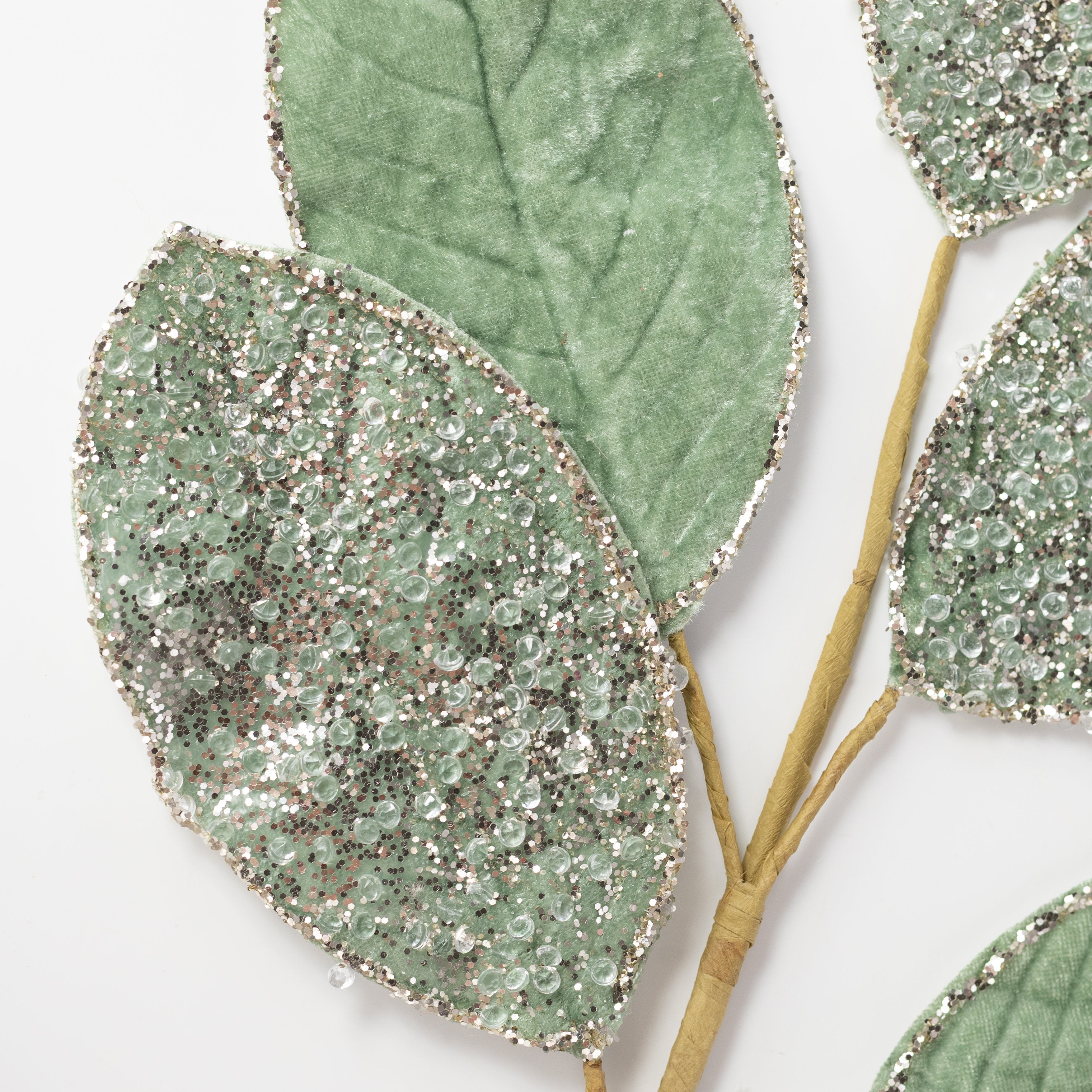 25" Iced Velvet Magnolia Leaf Stem: Sage Green Lifestyle Photo