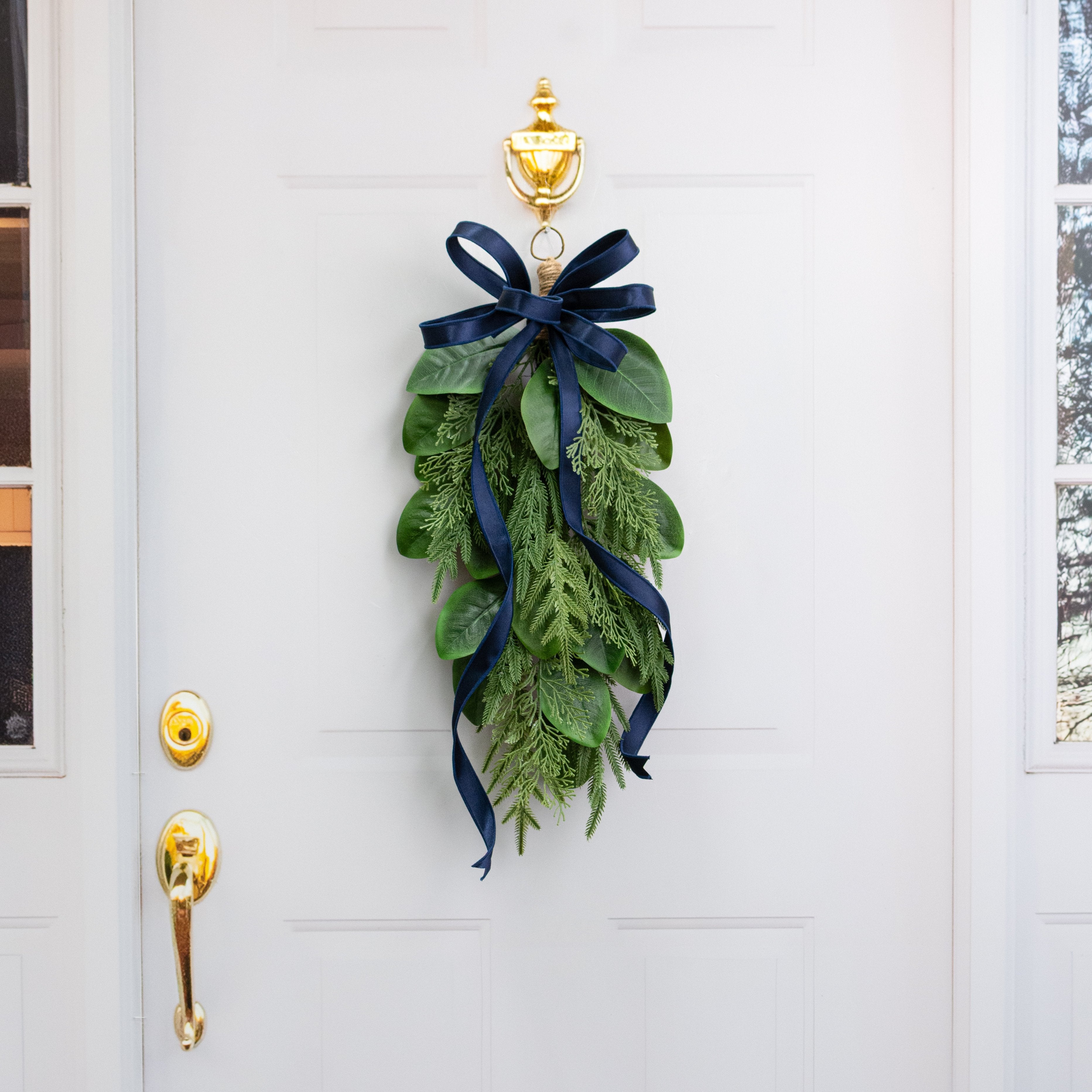 26" Magnolia Leaves with Norfolk & Cedar Pine Teardrop Lifestyle Photo
