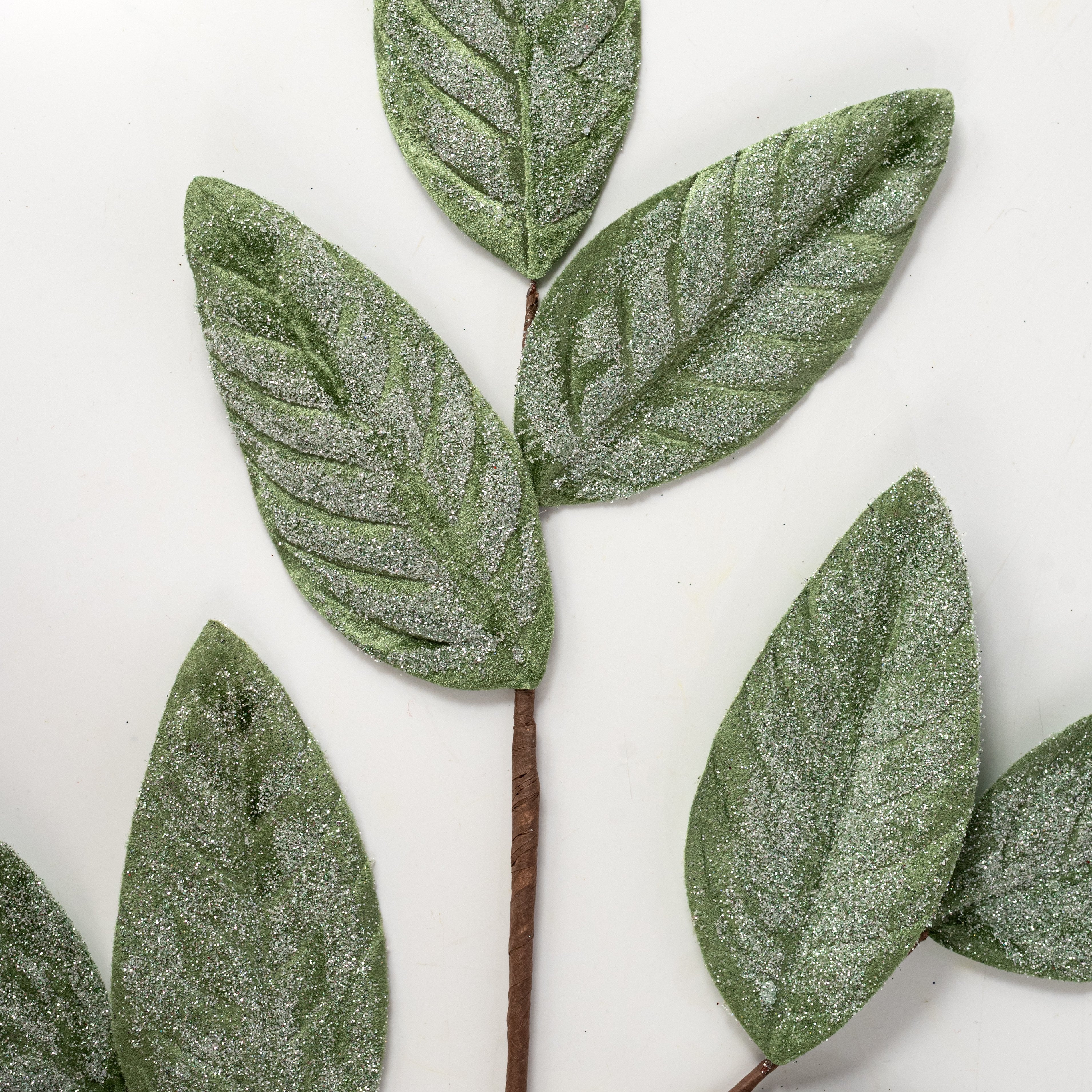 28" Sparkle Magnolia Leaves Spray: Sage Green Lifestyle Photo