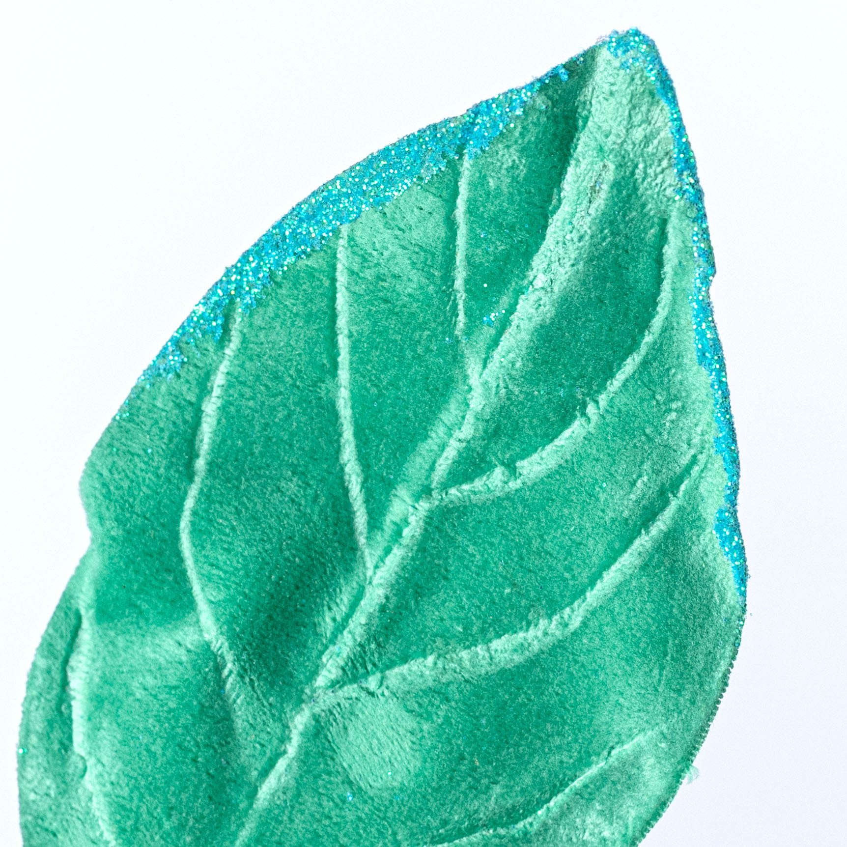 30" Velvet Magnolia Leaves Spray: Mint Green Lifestyle Photo