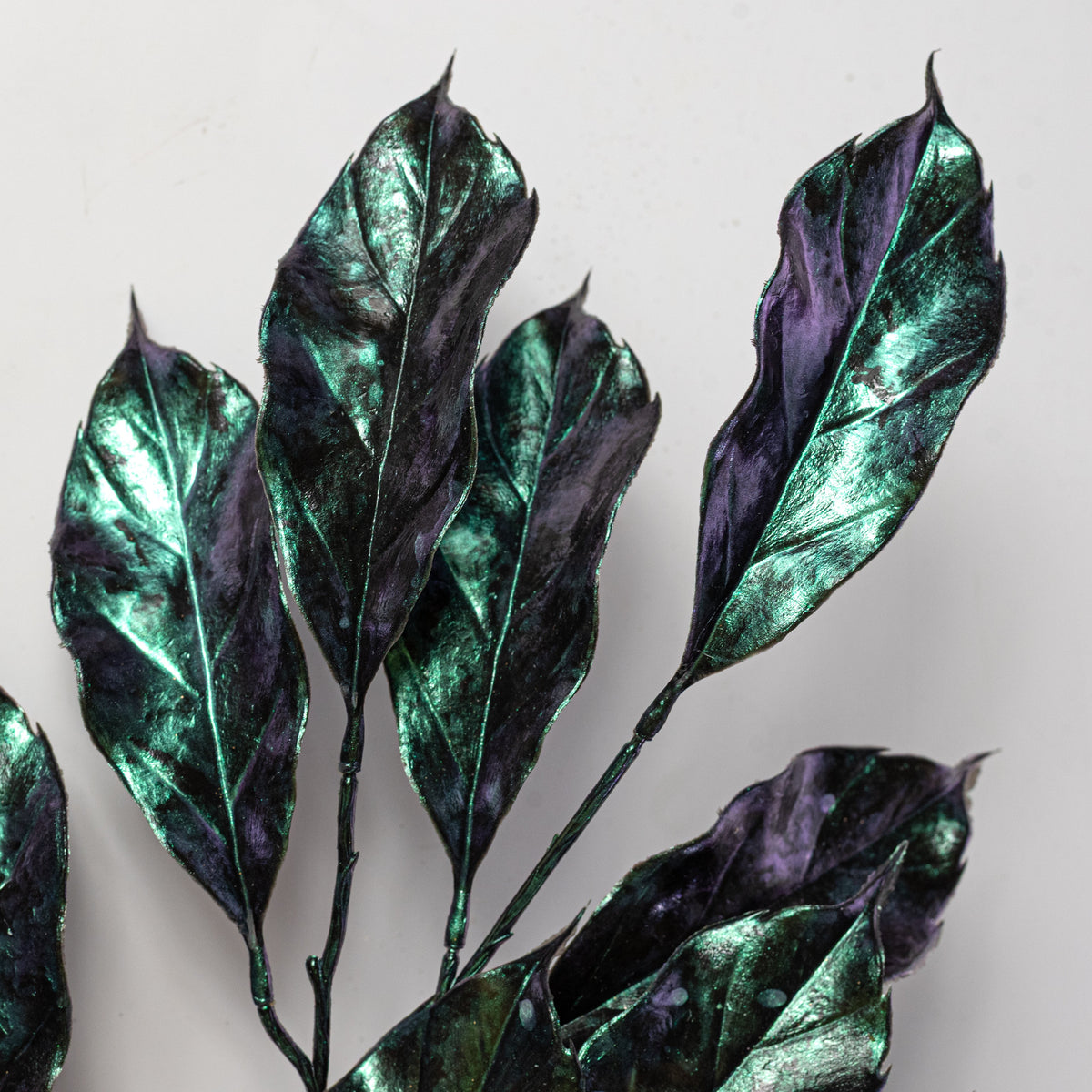 31" Metallic Magnolia Leaf Spray: Peacock Lifestyle Photo