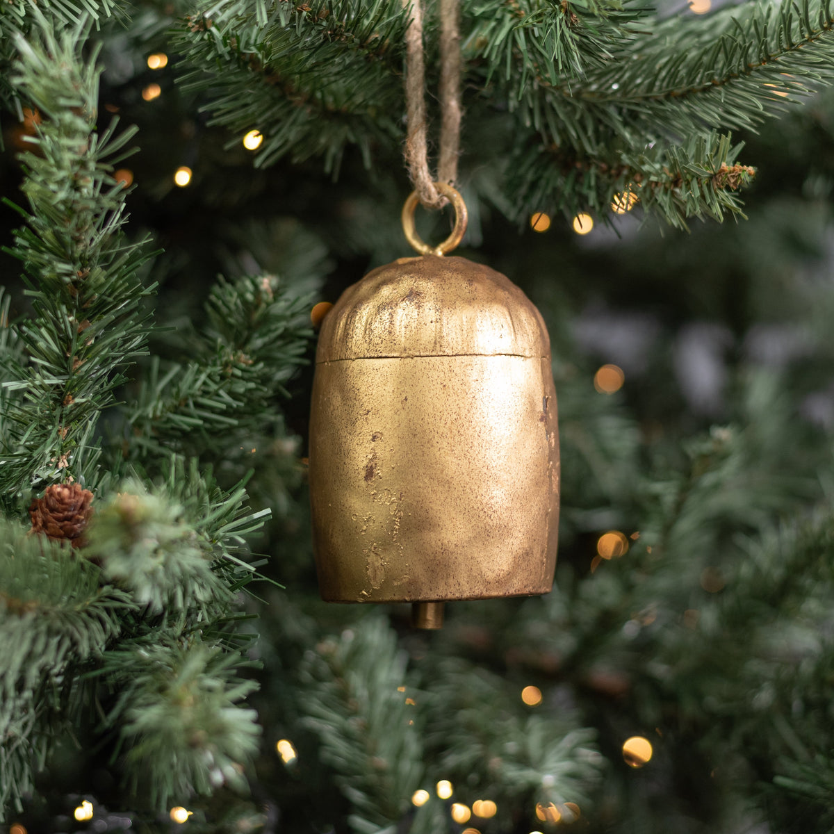 5.5" Oval Cow Bell Ornament: Vintage Gold Lifestyle Photo