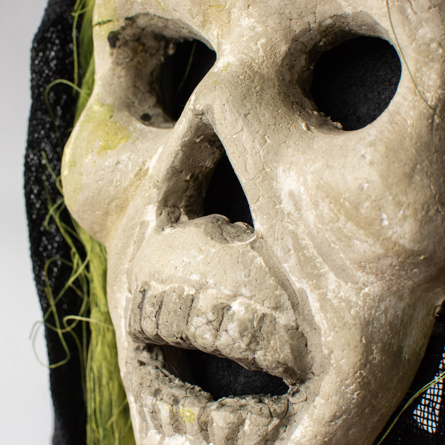 20" x 6" Styrofoam & Burlap Witch Skull: Green & Black