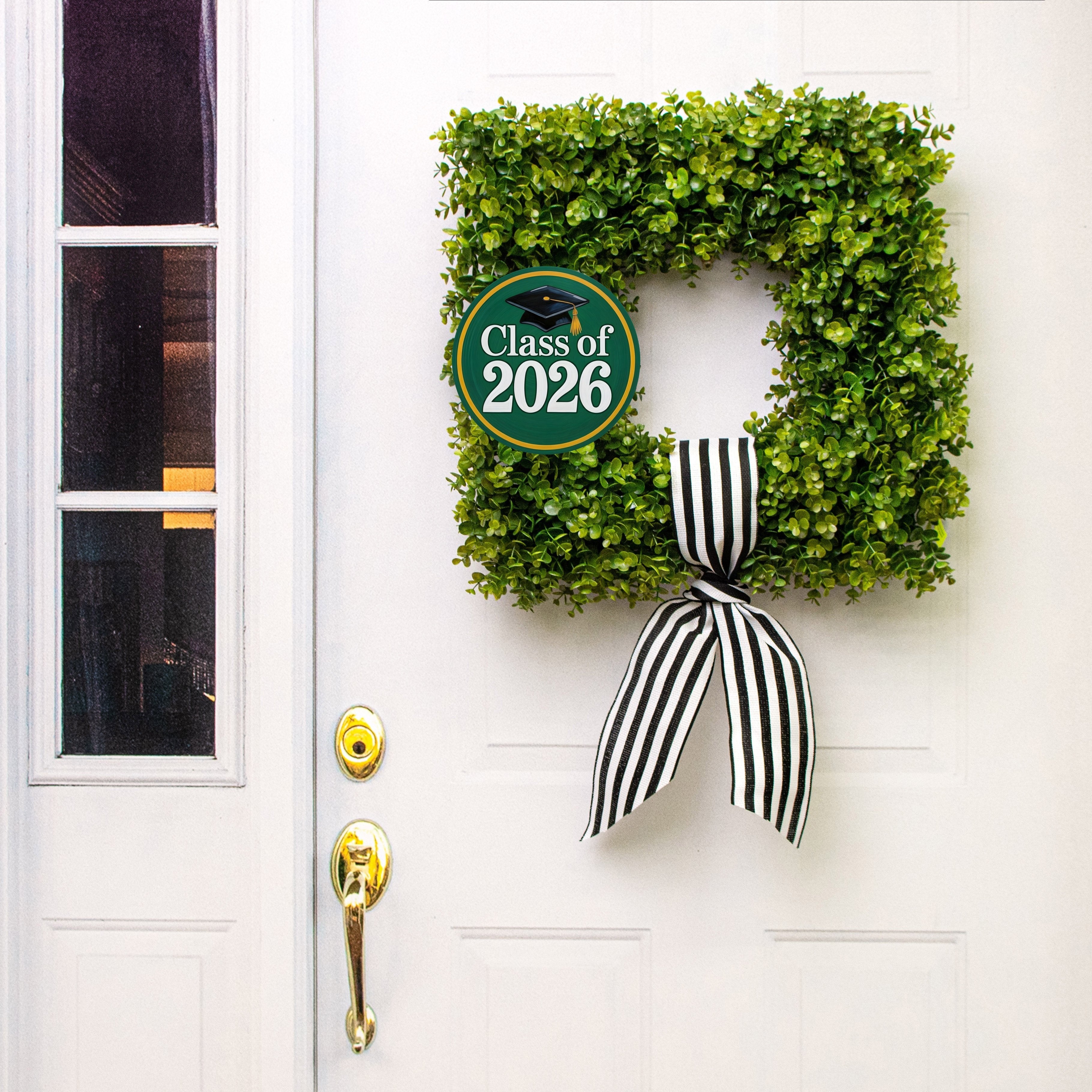 8.5" Round Waterproof Sign: Green & Golden Yellow Graduation 2026 Lifestyle Photo