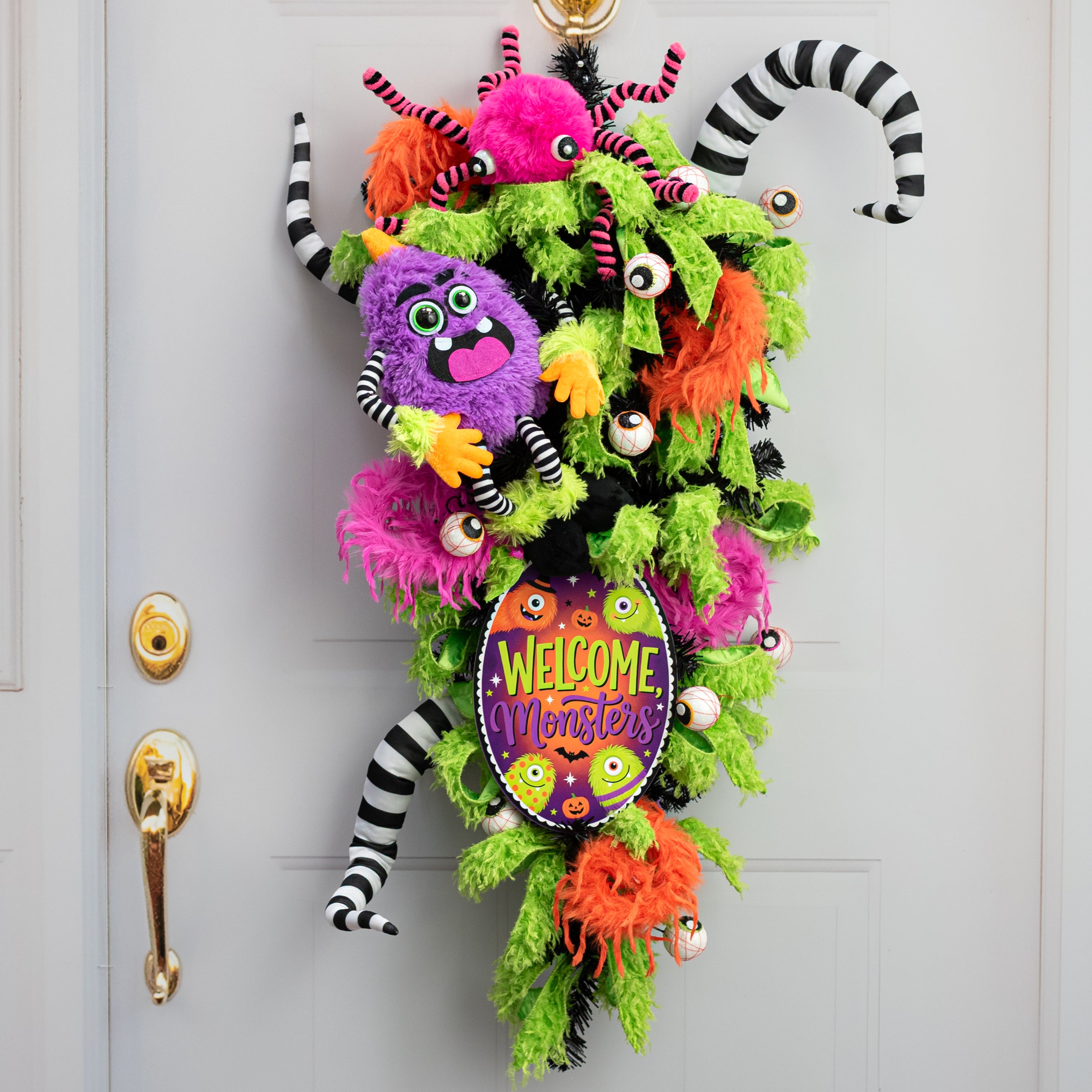 10.5" Oval Waterproof Sign: Furry One-Eyed Halloween Monsters