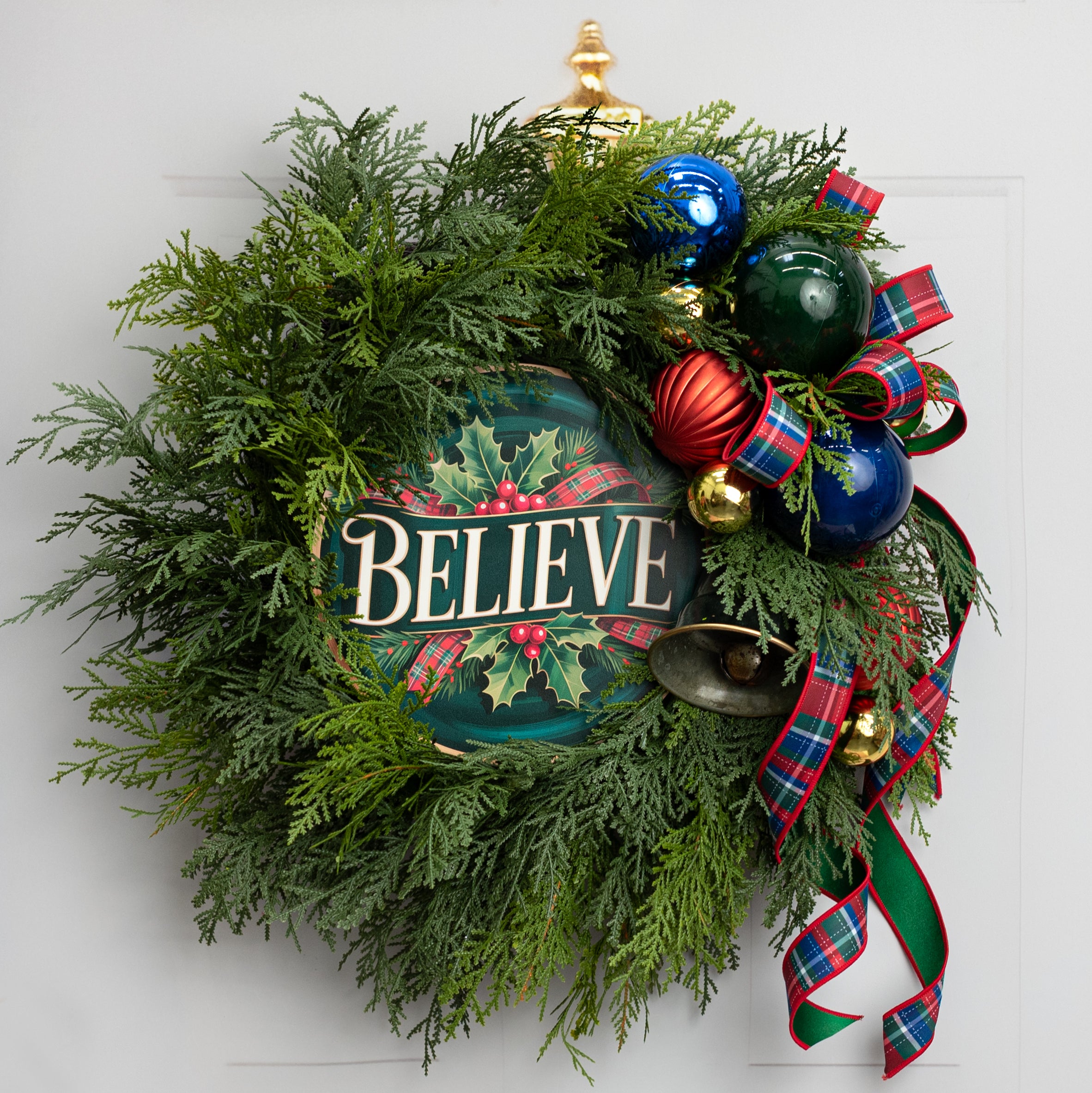 10.5" Round Waterproof Sign: Green Jewel Tone Plaid Believe