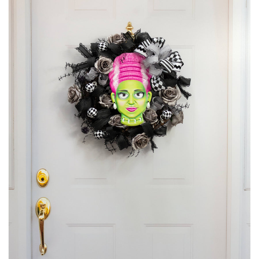 12" Embossed Metal Mrs. Frankenstein Head Decoration: Pink