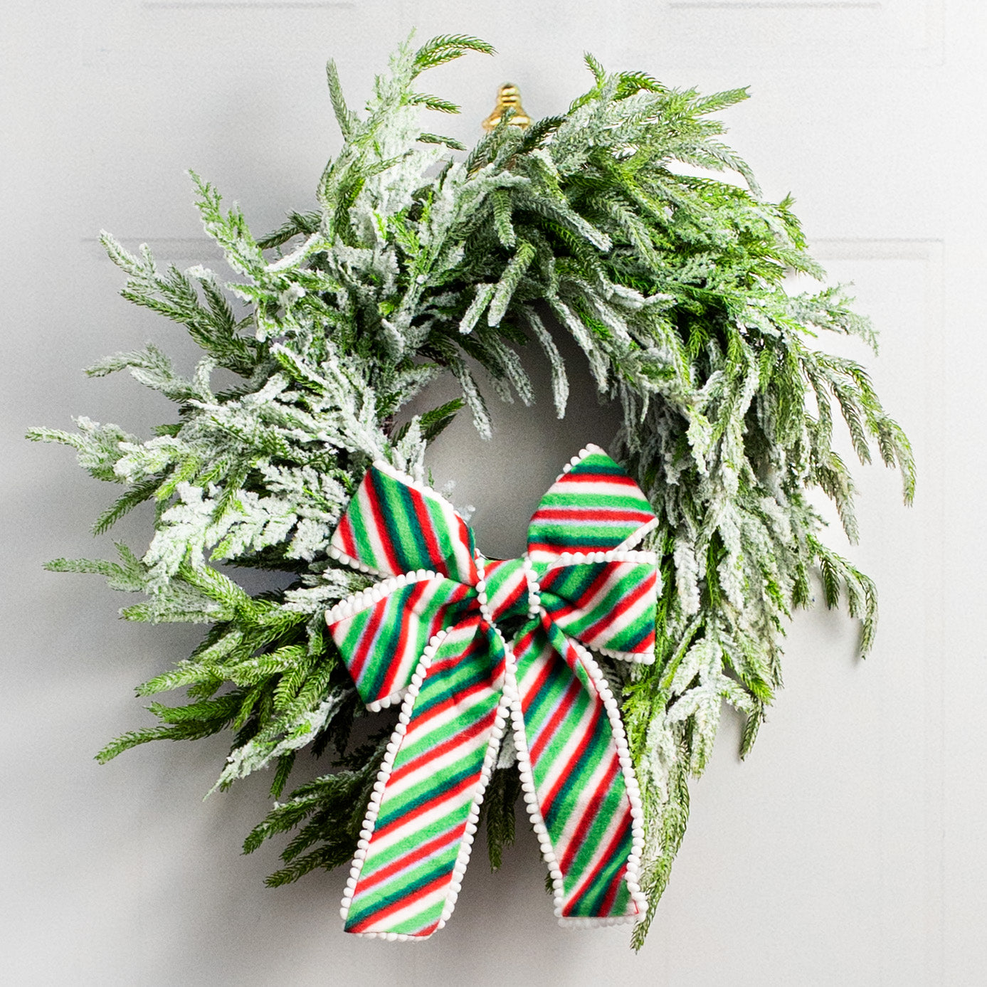 13.8" Ball Fringe Stripe Bow Ornament: Red, Green, White Lifestyle Photo