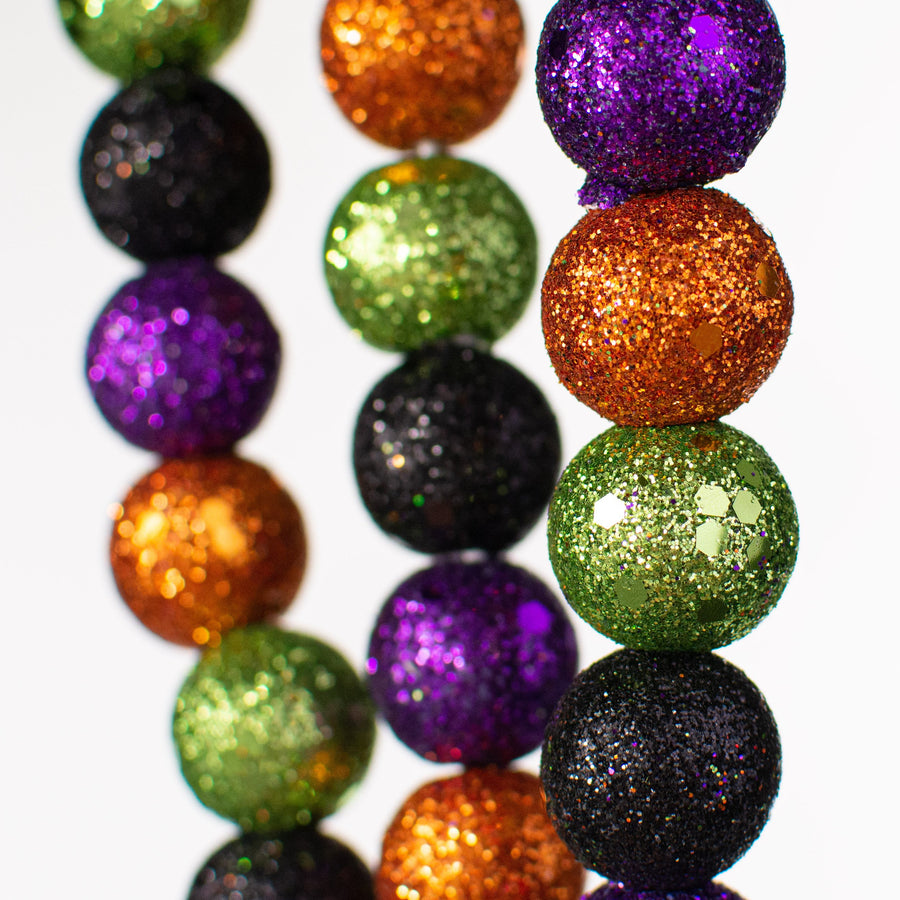Beaded Glitter Ball Spray: Purple, Lime, Black, Orange (28") Lifestyle Photo