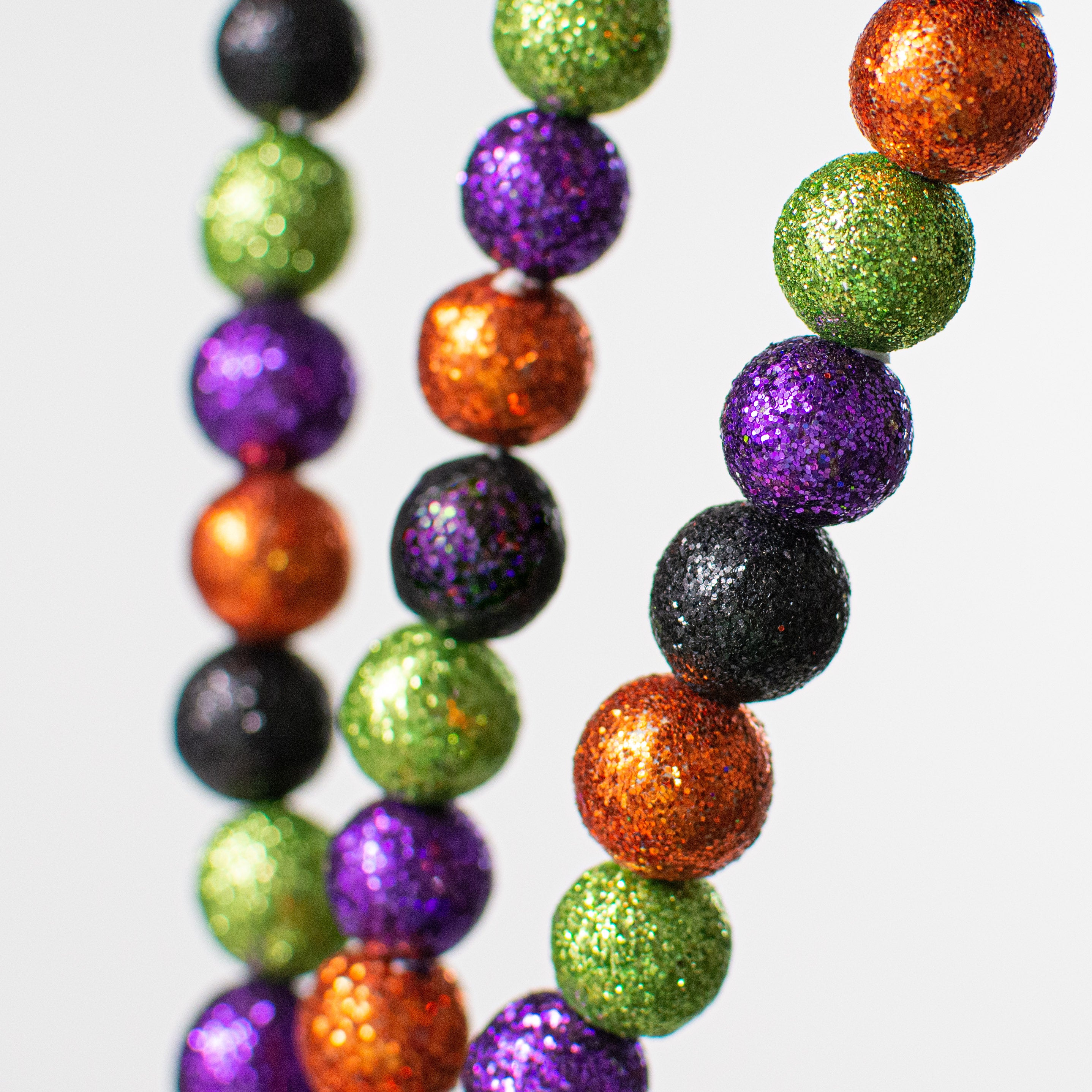 Beaded Glitter Ball Spray: Purple, Lime, Black, Orange (25") Lifestyle Photo