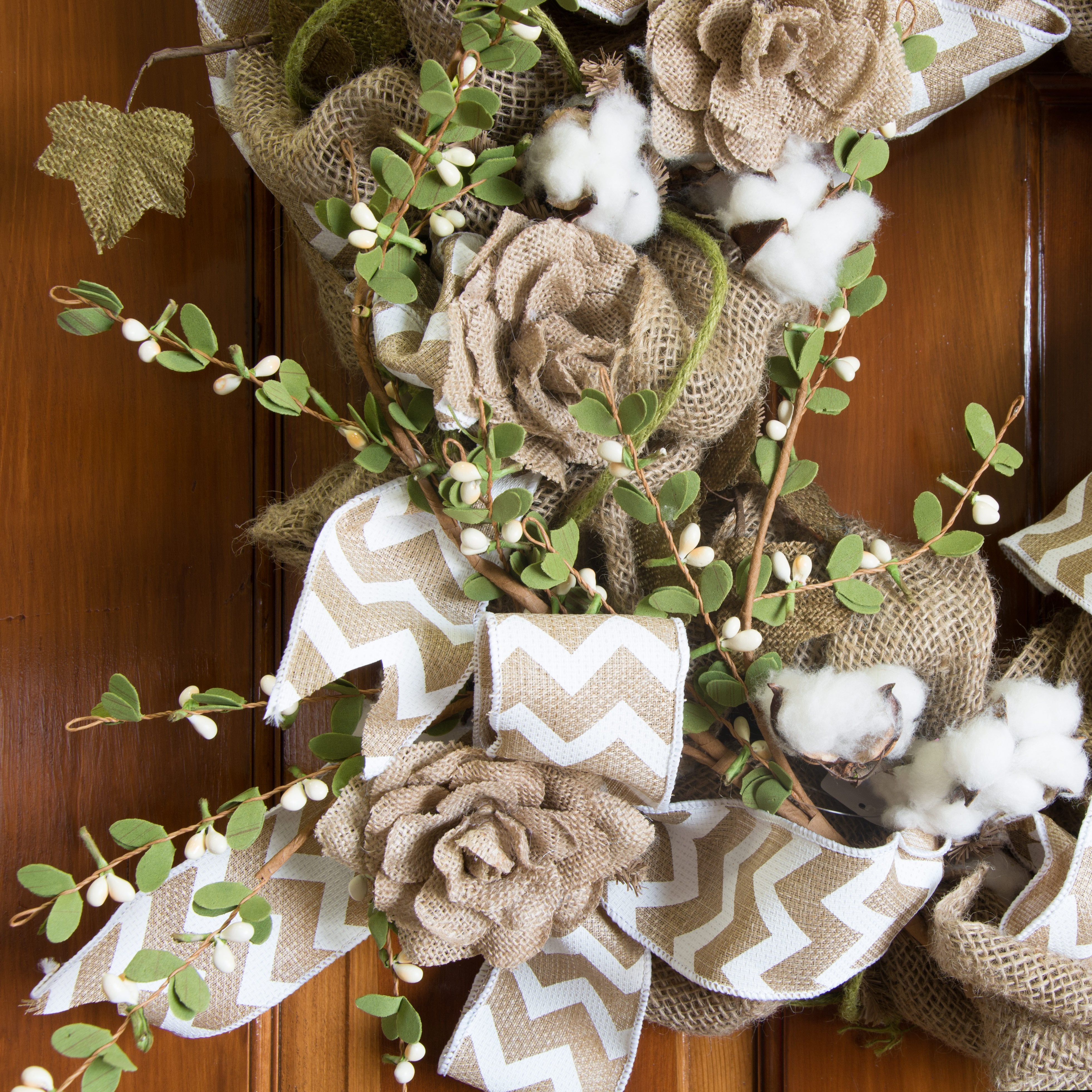 32" Boxwood Floral Spray With Cream Berries Lifestyle Photo