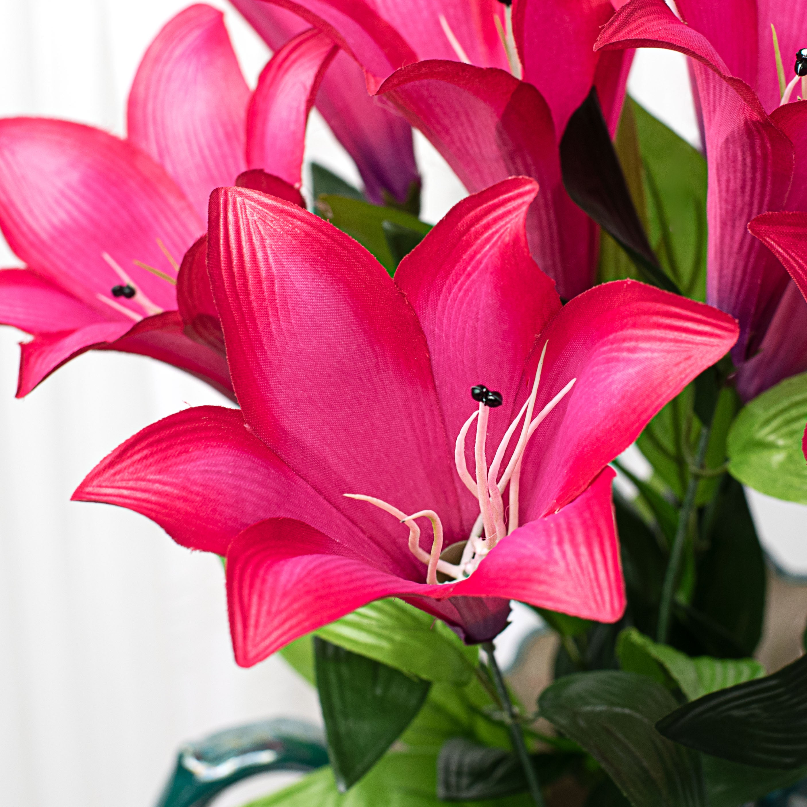 24" Colorfast Lily Bush: Fuchsia Pink Lifestyle Photo
