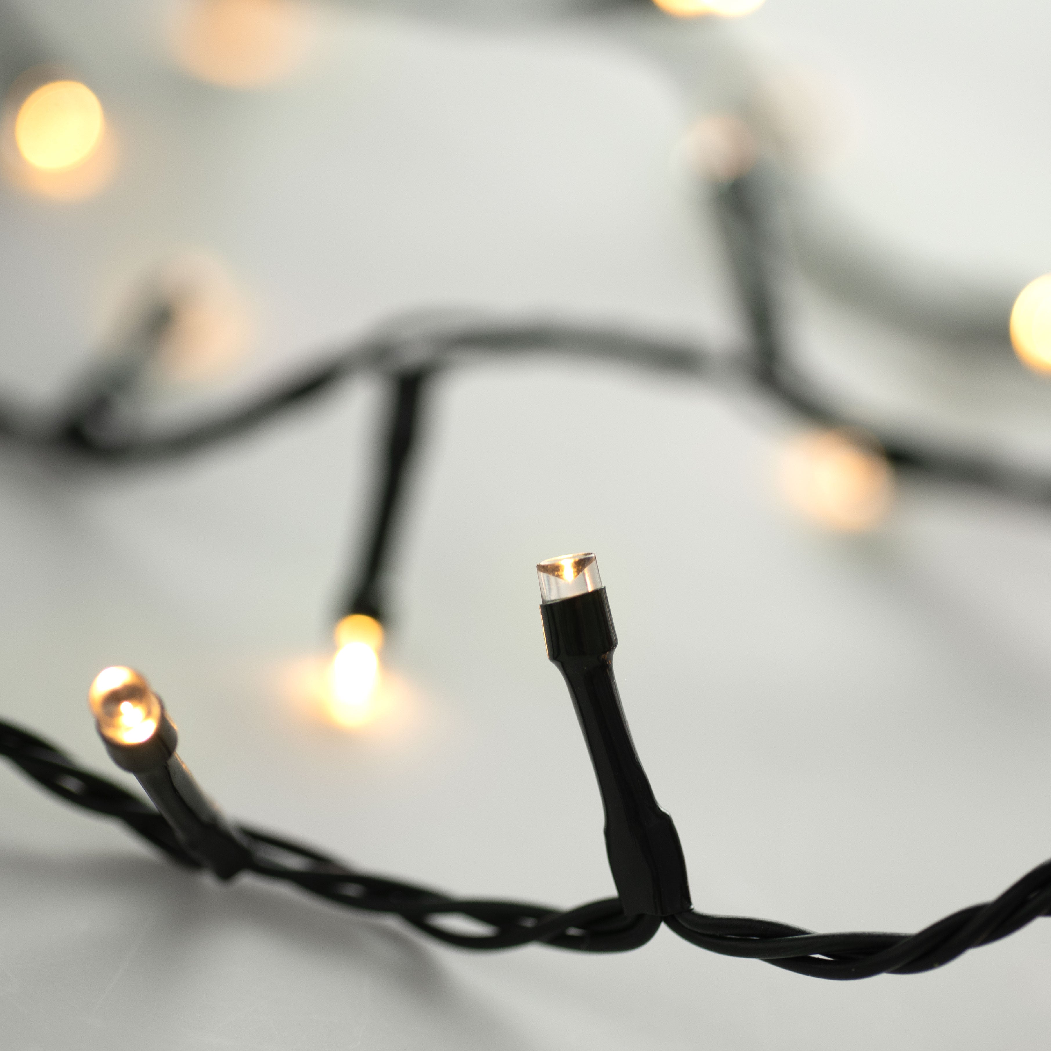 240'' Compact Twinkle Lights With Timer & Remote: Warm White, Green Item Number: 284760