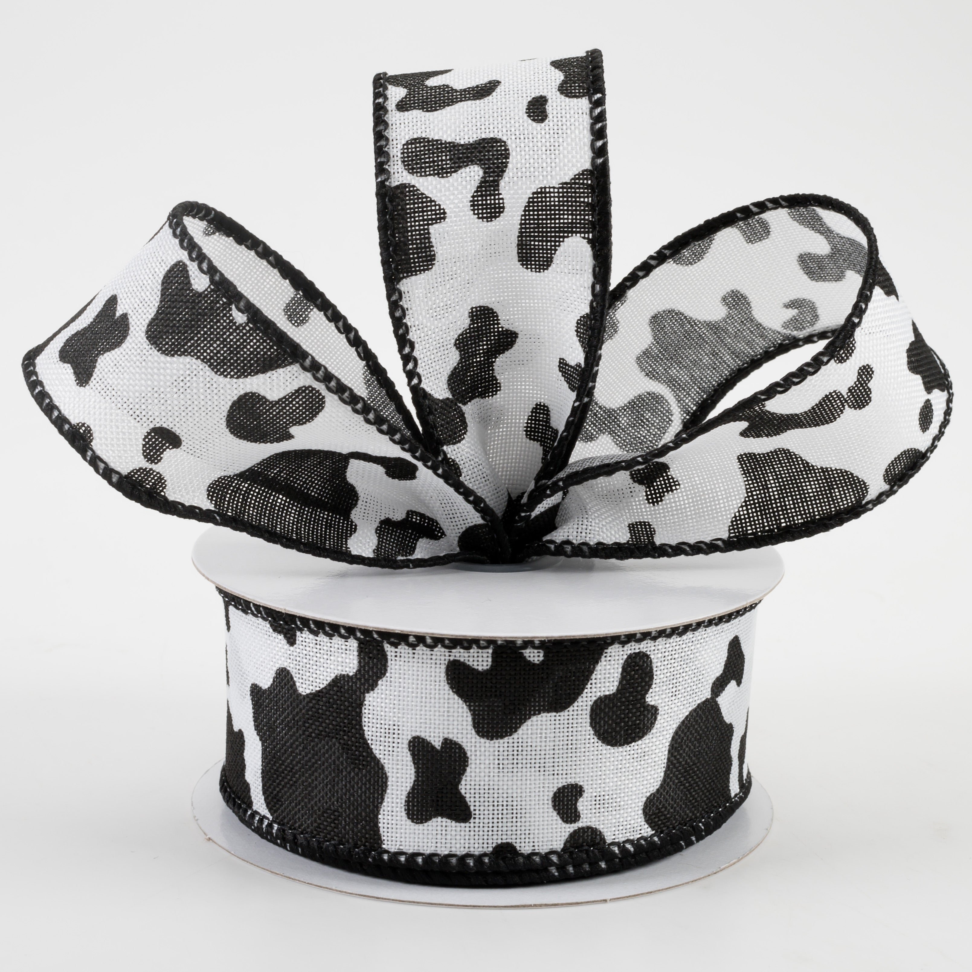 1.5" Cow Print Linen Ribbon: White & Black (10 Yards) Lifestyle Photo