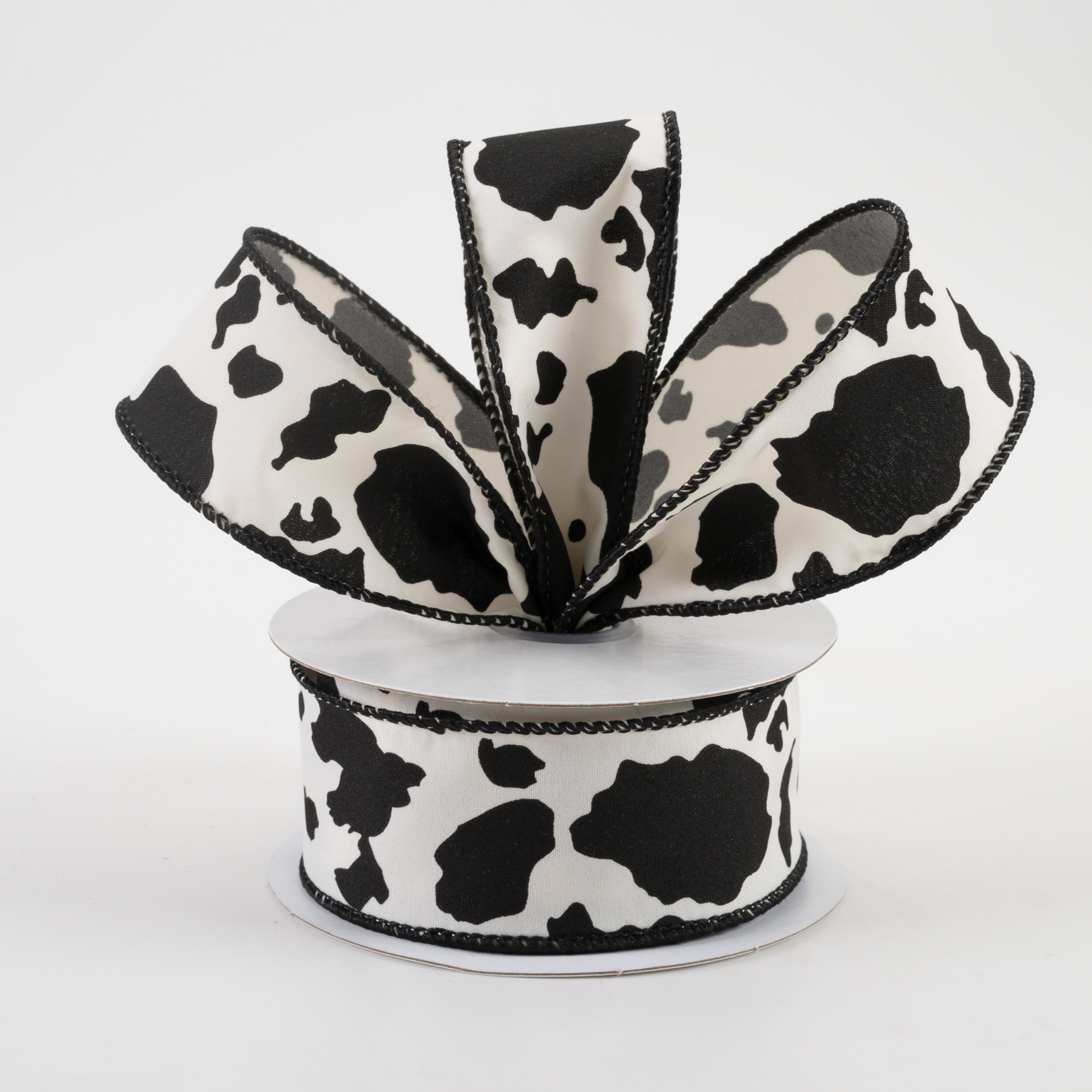 1.5" Cowhide Print Ribbon: Black & Ivory (10 Yards) Lifestyle Photo