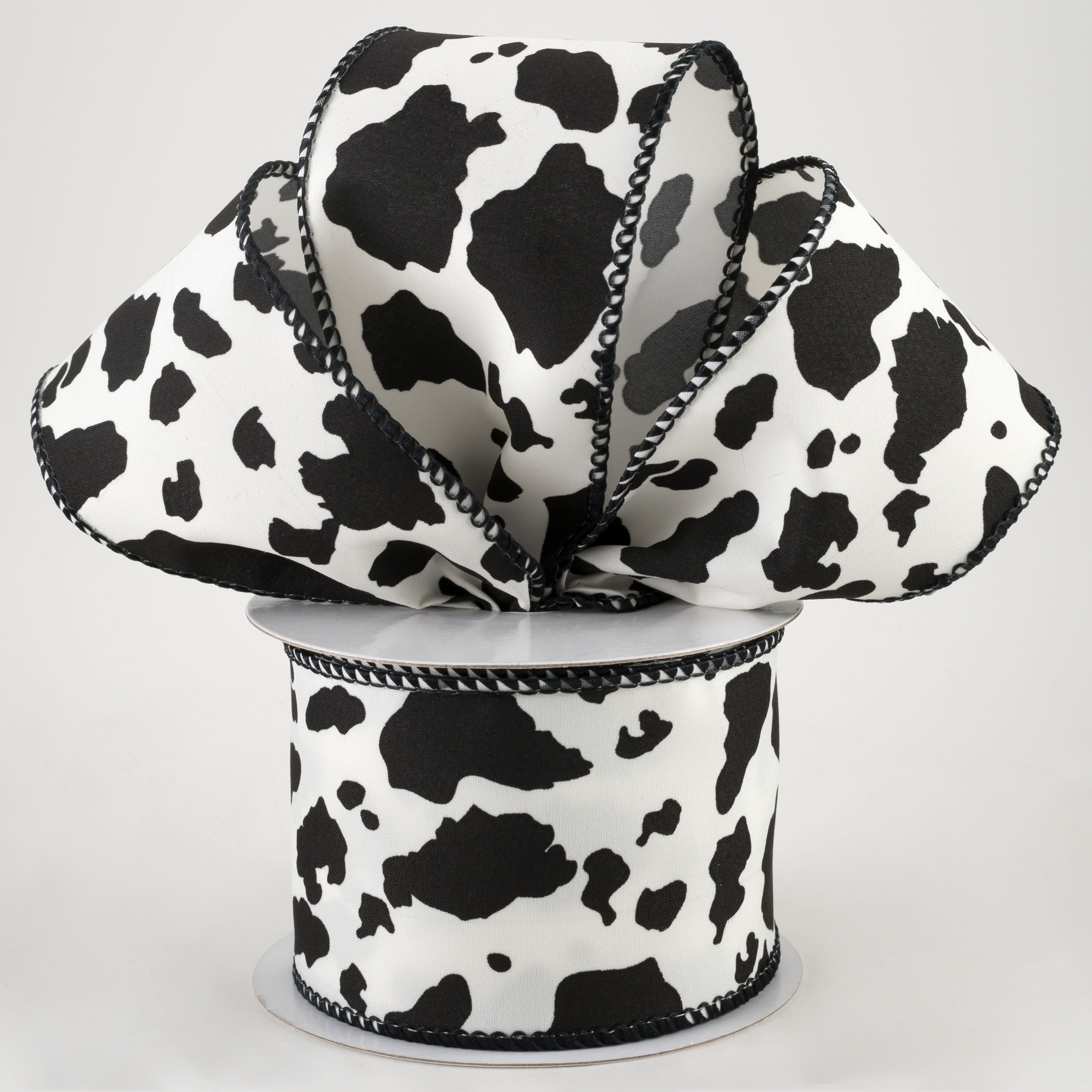 2.5" Cowhide Print Ribbon: Black & Ivory (10 Yards) Lifestyle Photo