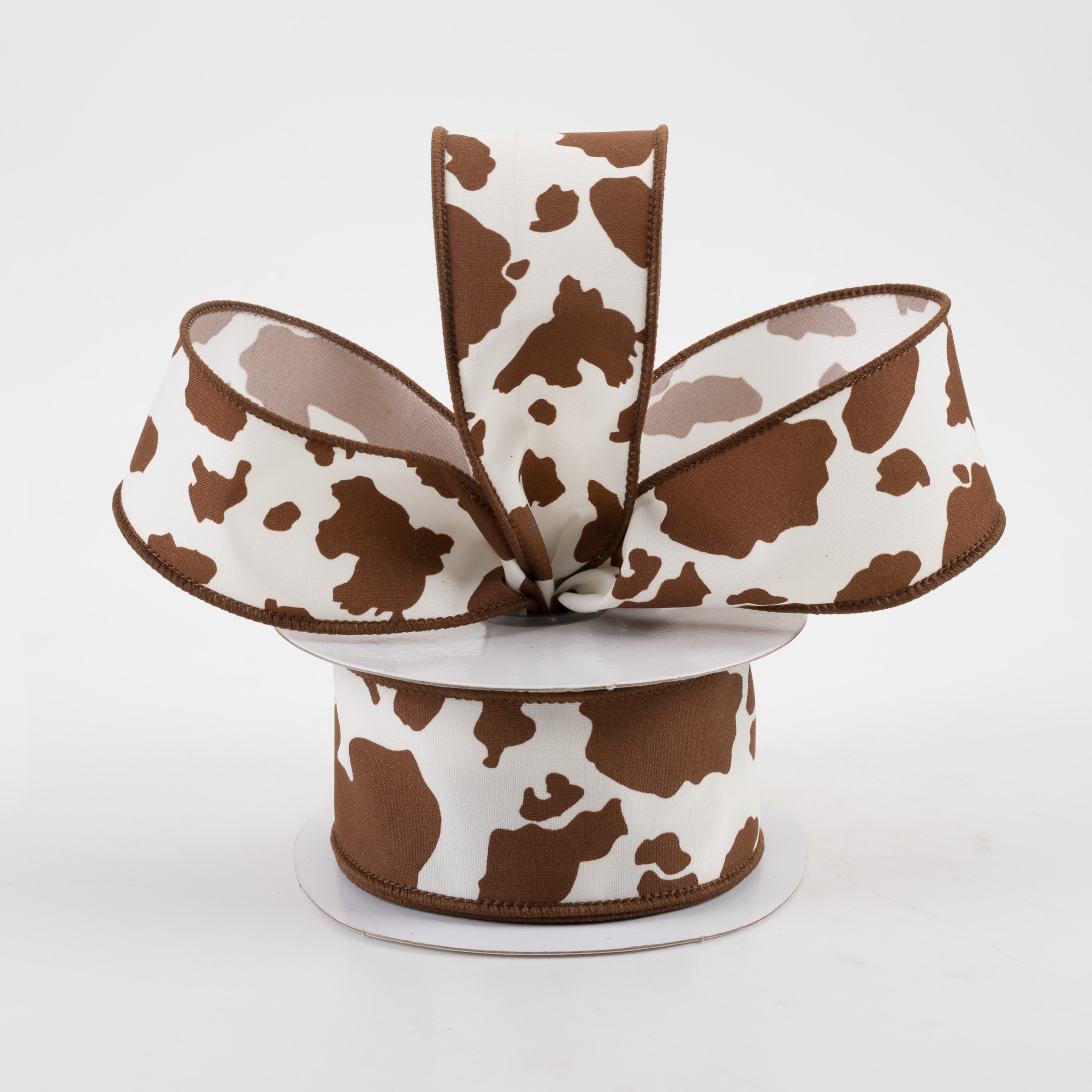 1.5" Cowhide Print Ribbon: Brown & Ivory (10 Yards) Lifestyle Photo