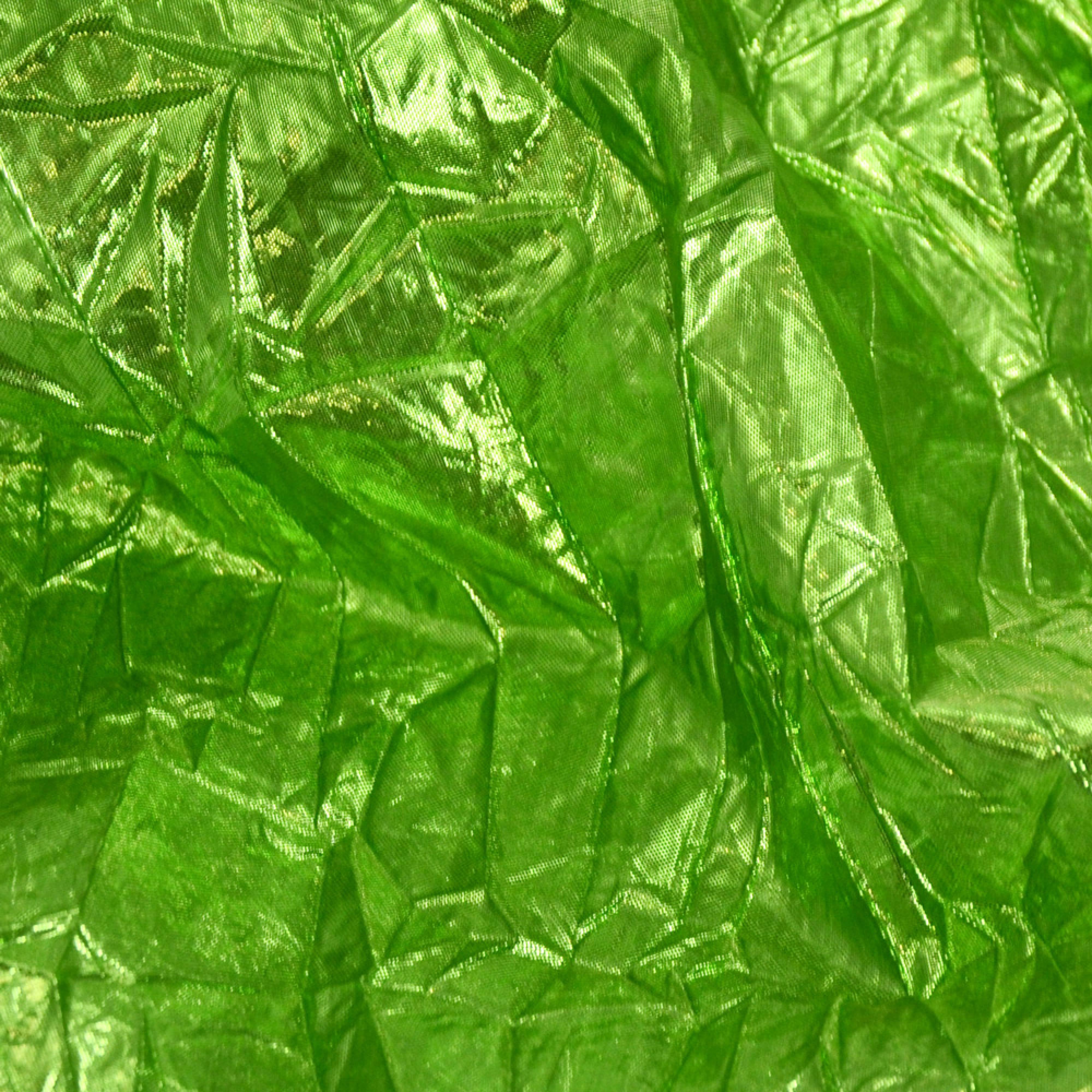 Crushed Metallic Lamé Fabric Roll: Lime Green Lifestyle Photo