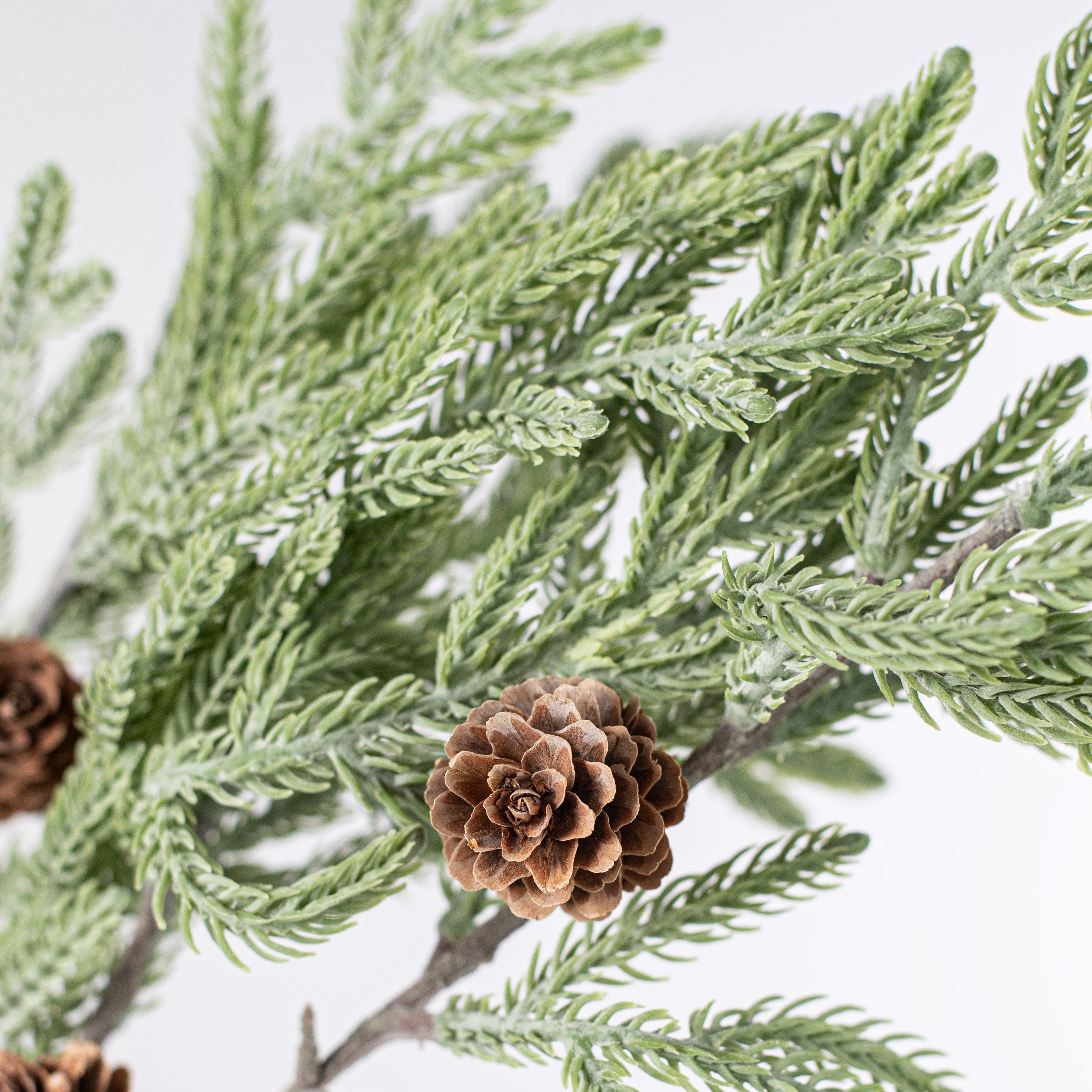 36" Cypress Pinecone Branch: Light Green Lifestyle Photo