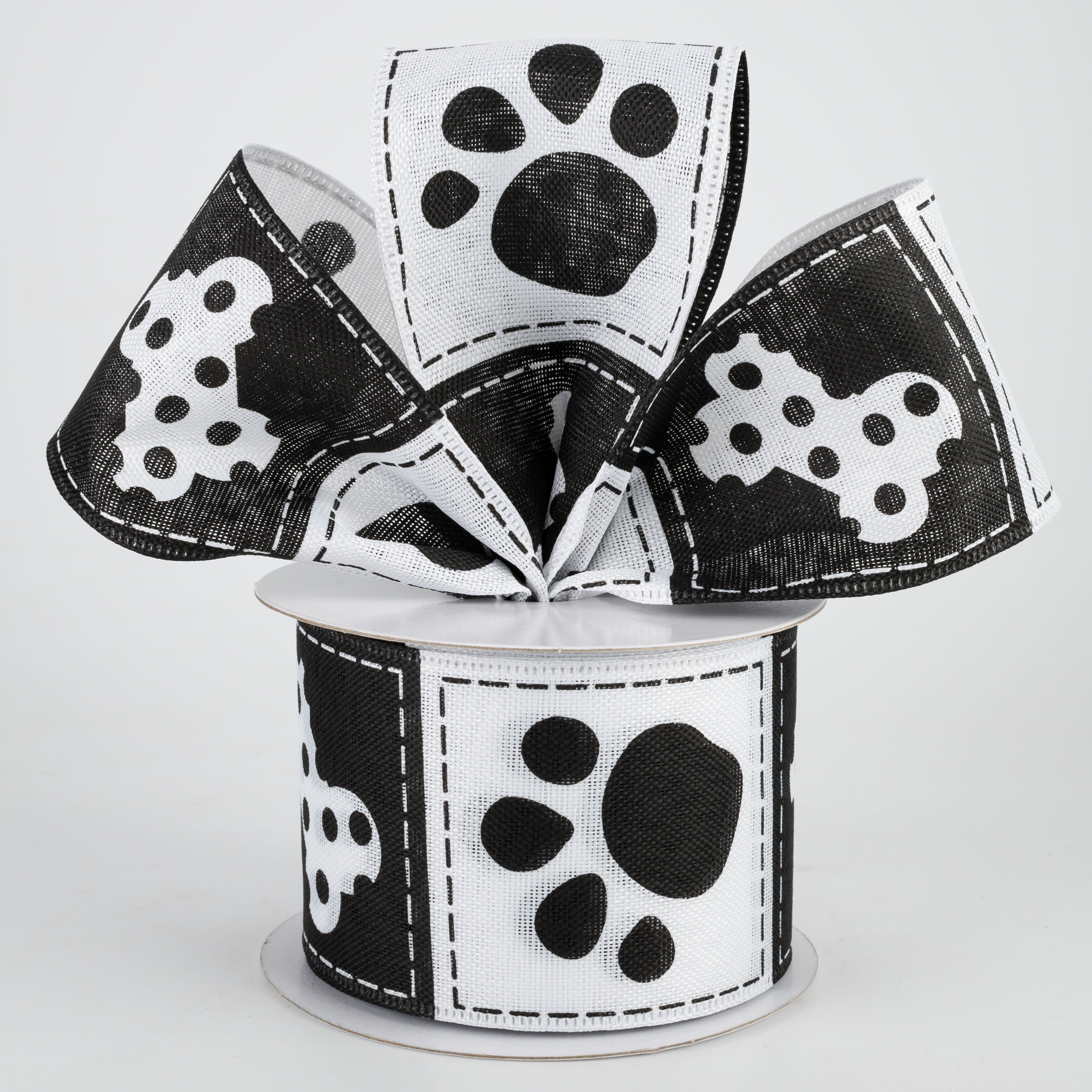 2.5" Doggie Paw Prints Bones Ribbon: Black & White (10 Yards) Lifestyle Photo