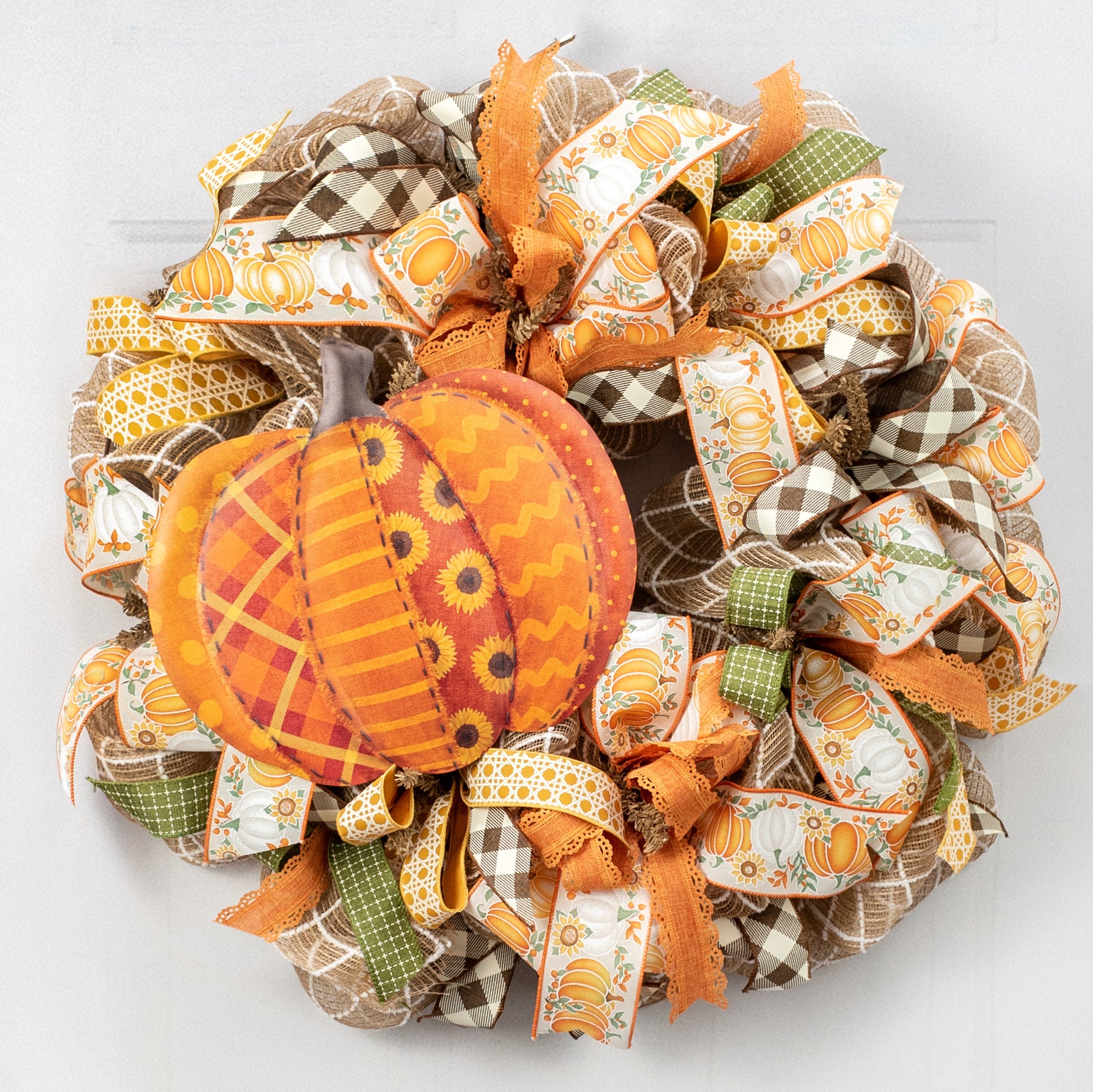 12" Embossed Metal Pumpkin Hanger: Quilted Orange Lifestyle Photo