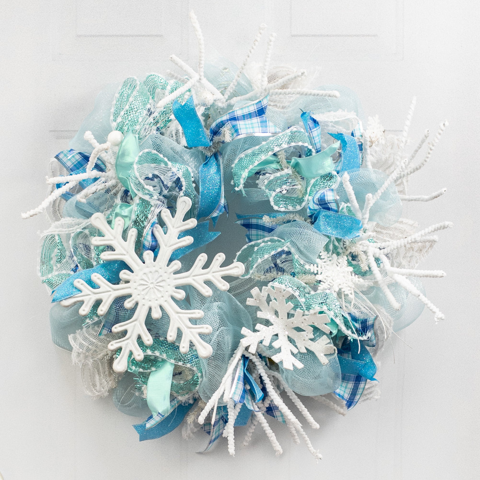 12" Embossed Metal Snowflake Hanger: White Lifestyle Photo