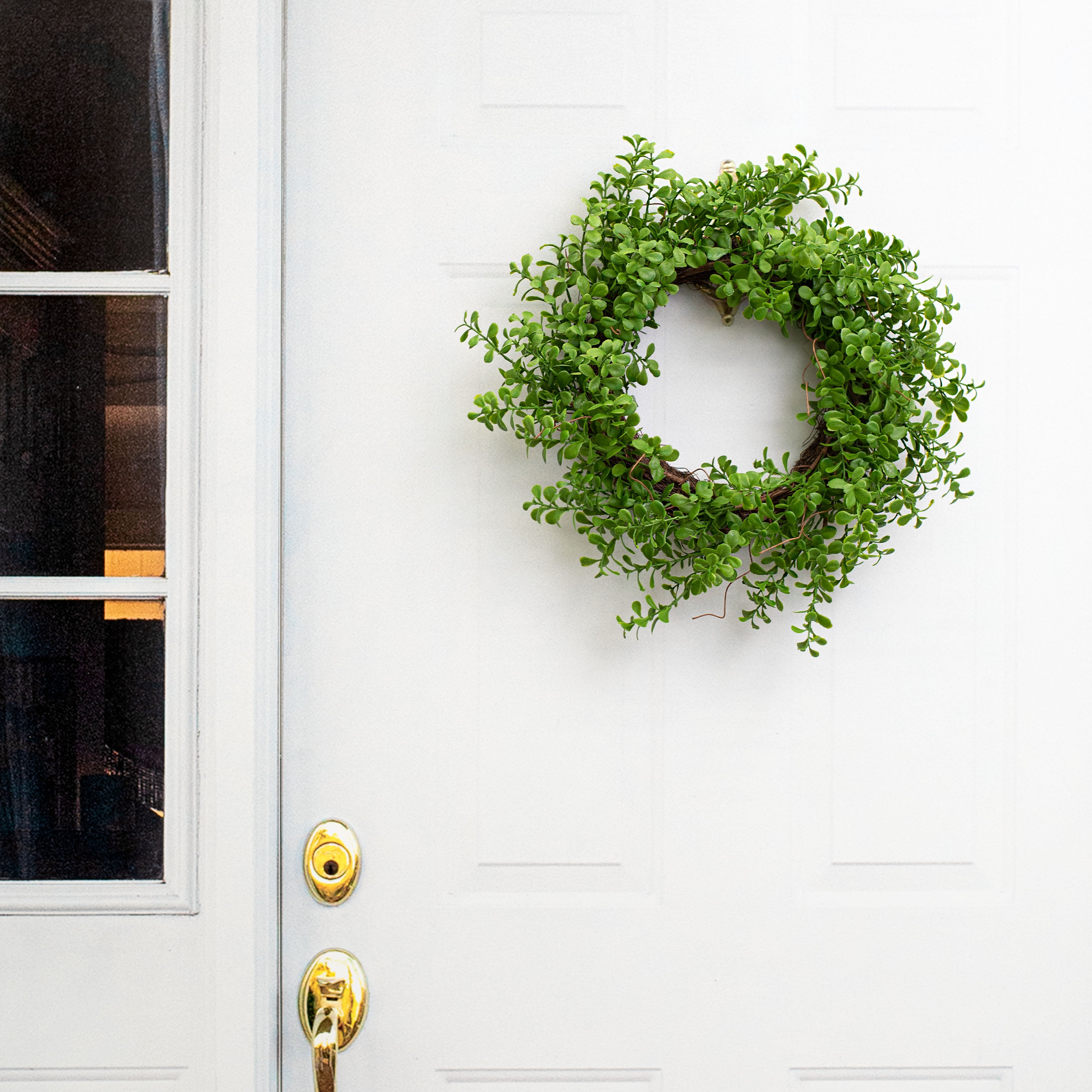 22" Evergreen Boxwood Twig Wreath Lifestyle Photo