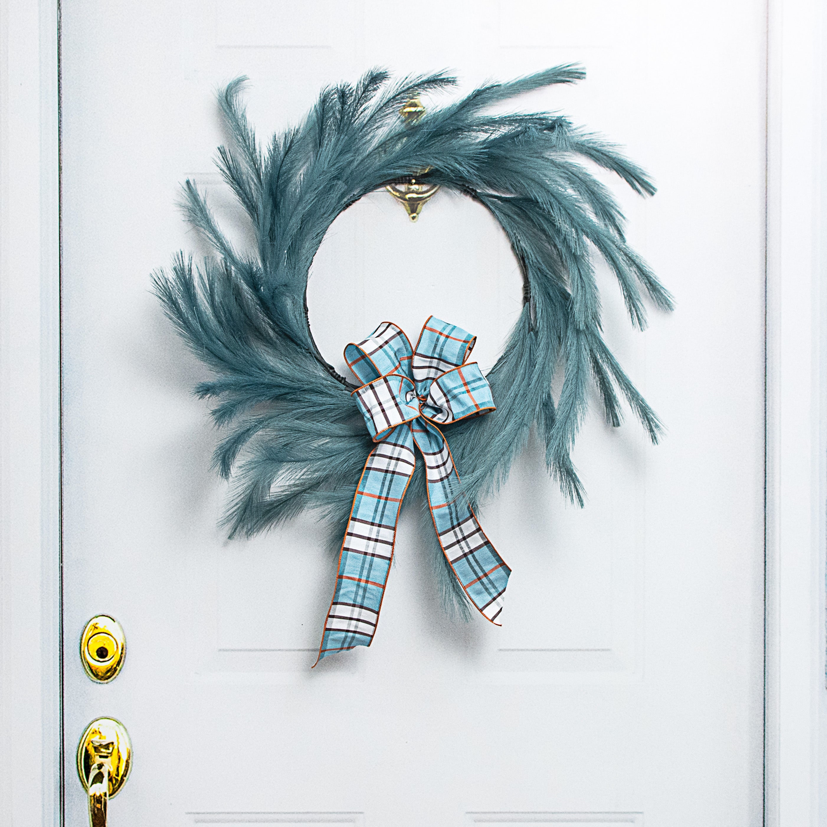 26" Fabric Pampas Grass Wreath: Dark Teal Lifestyle Photo