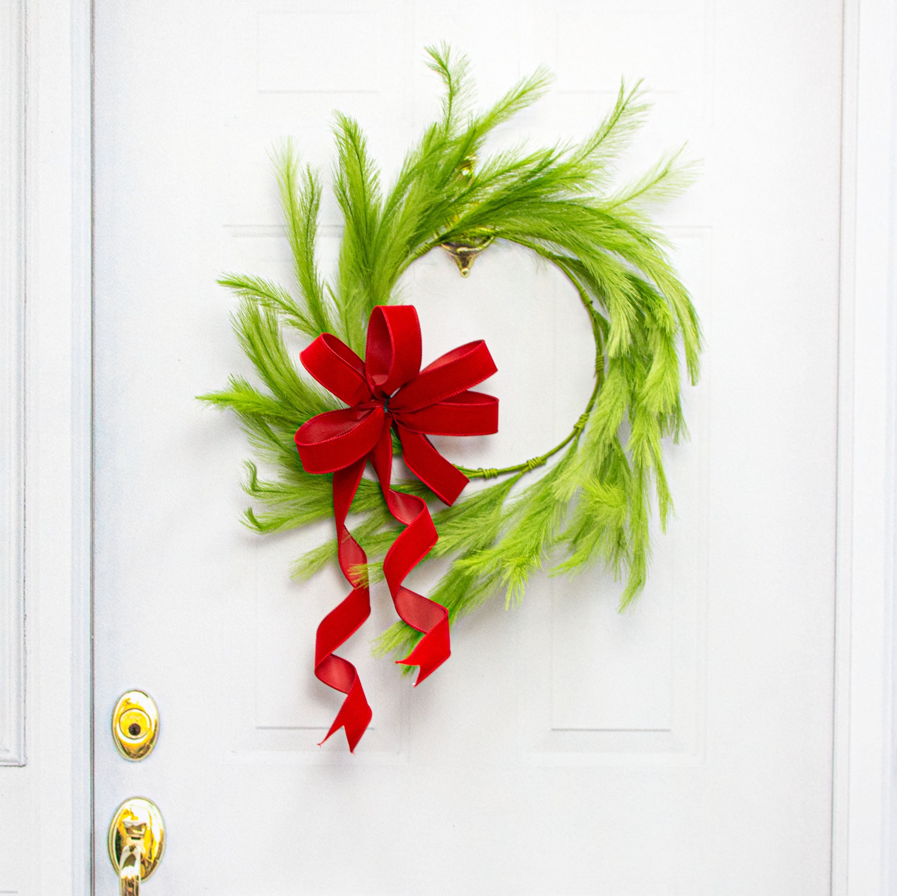 26" Fabric Pampas Grass Wreath: Lime Green Lifestyle Photo