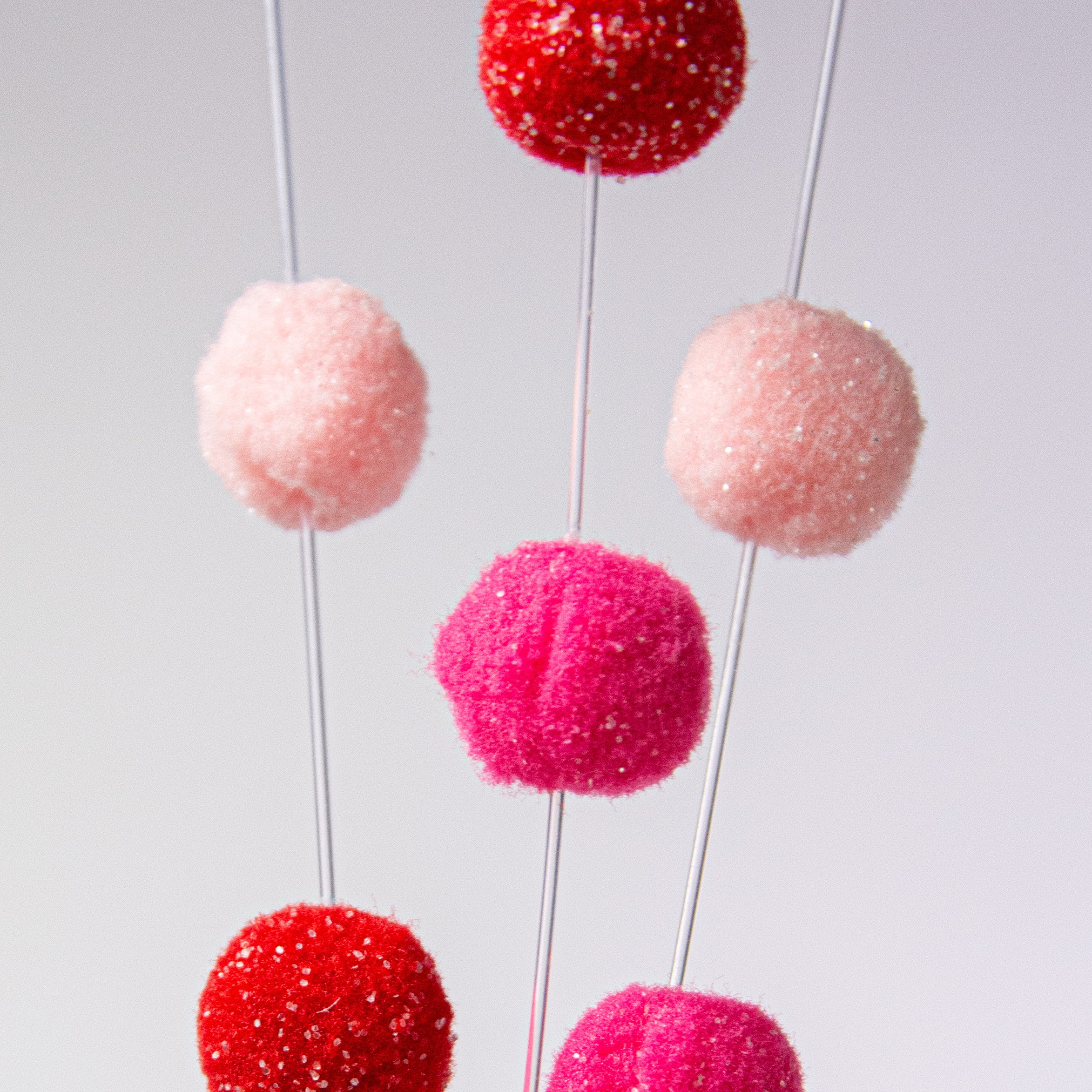 29" Felt Ball Spray: Pink, Fuchsia, Red Lifestyle Photo