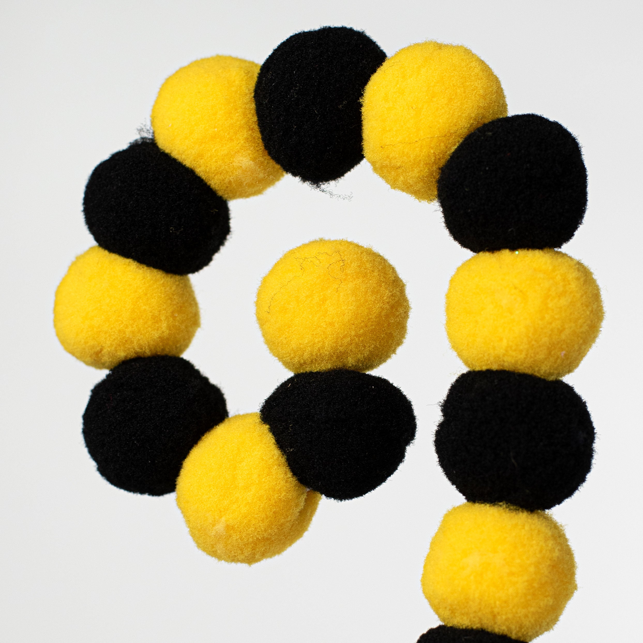 27" Felt Ball Spray: Yellow & Black Lifestyle Photo