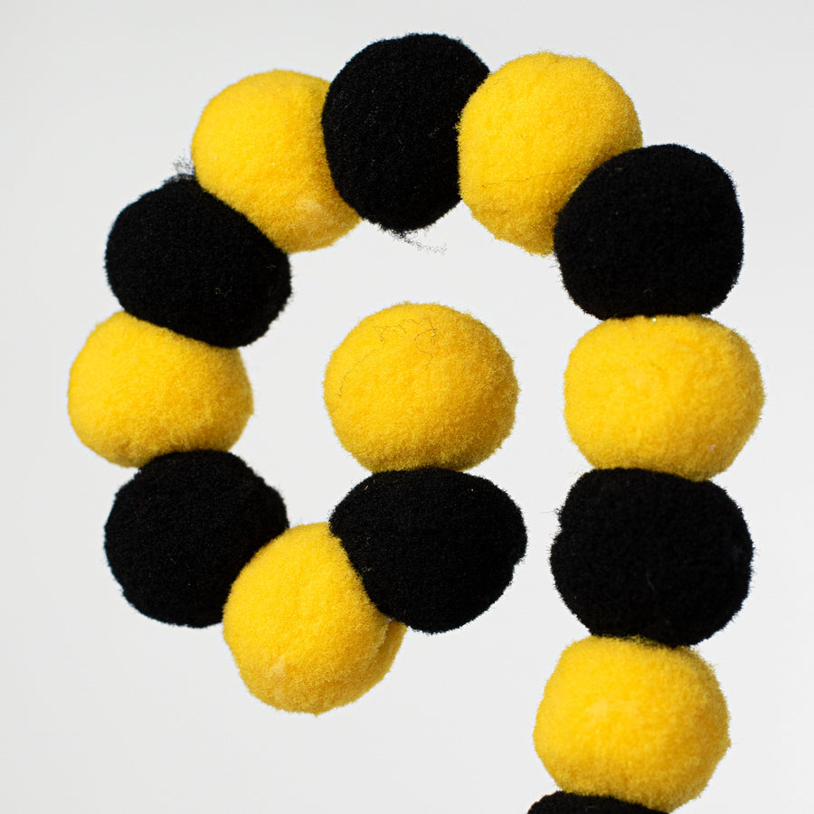 27" Felt Ball Spray: Yellow & Black Lifestyle Photo