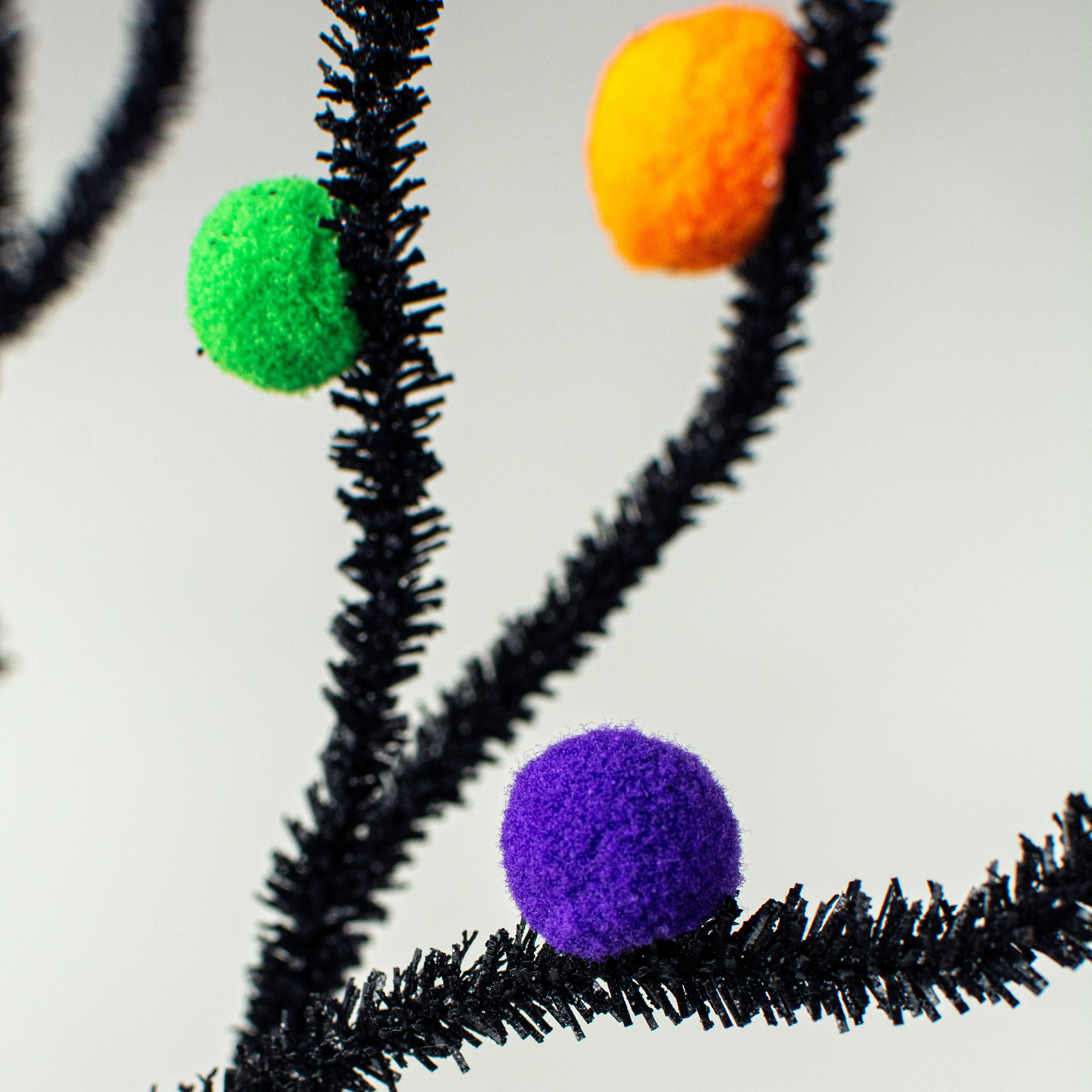 31" Felt Ball Twig Spray: Purple, Green, Orange Lifestyle Photo