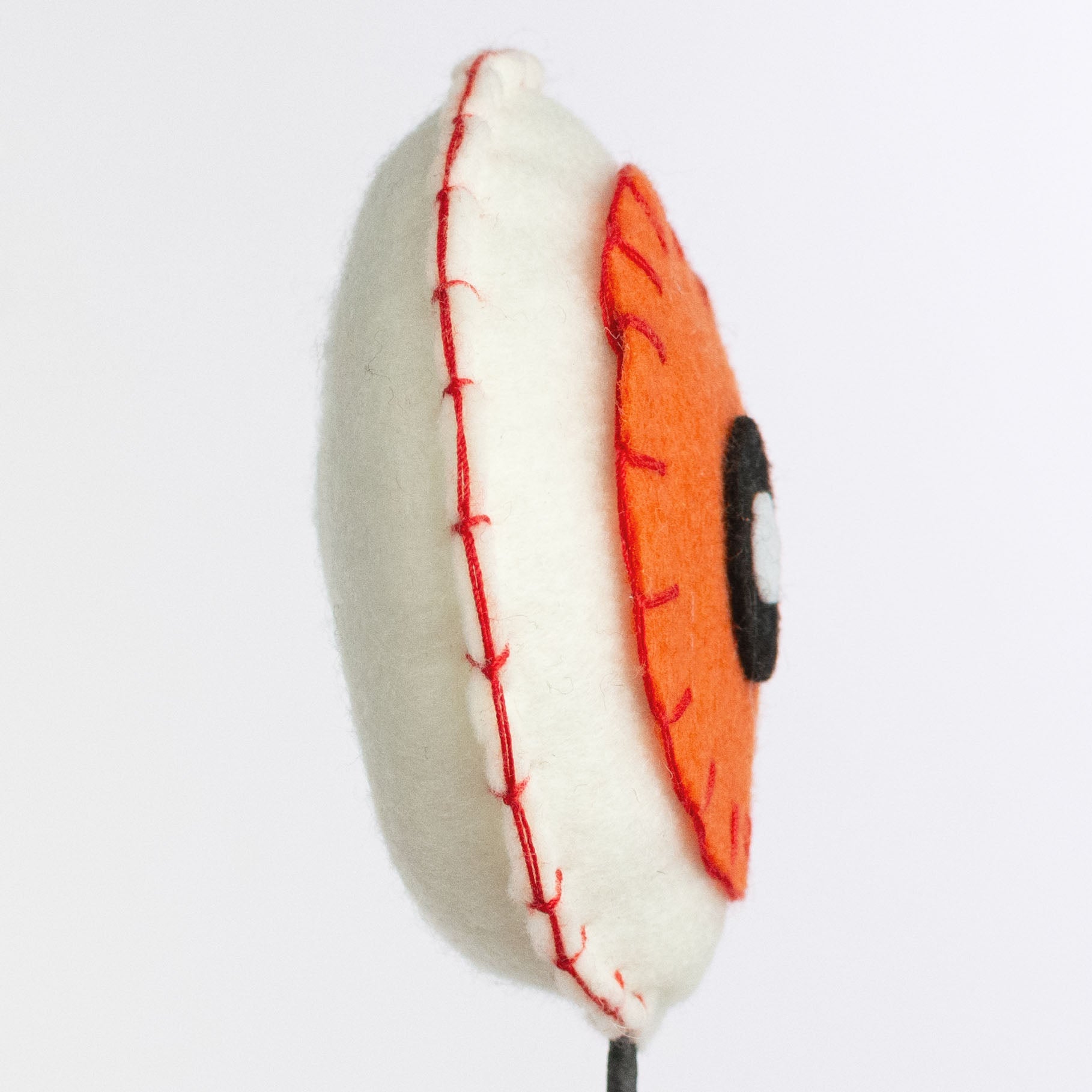 12" Felt Eyeball Pick: Orange Lifestyle Photo