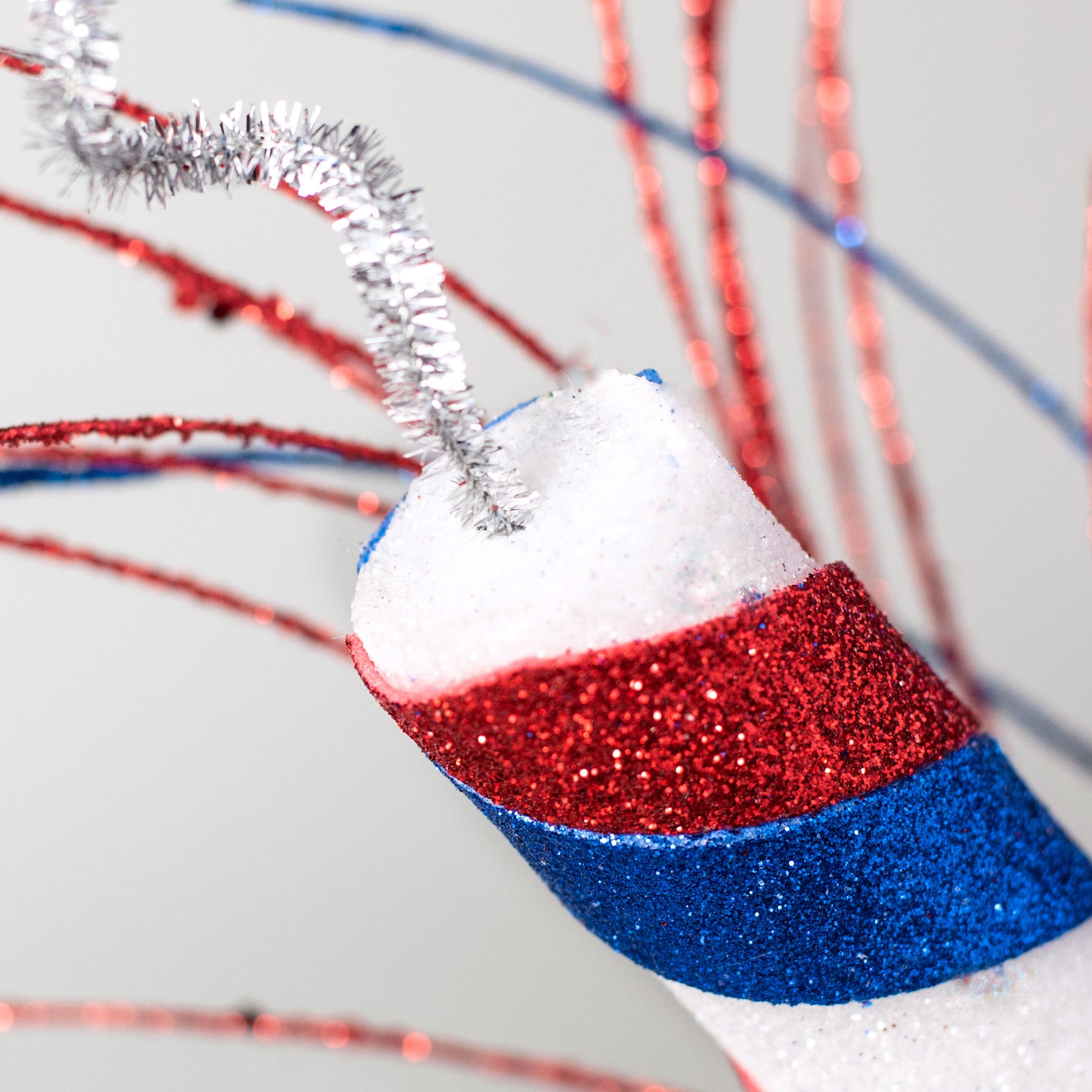 28" Firecracker Ball Spray: Red, White, Blue Lifestyle Photo