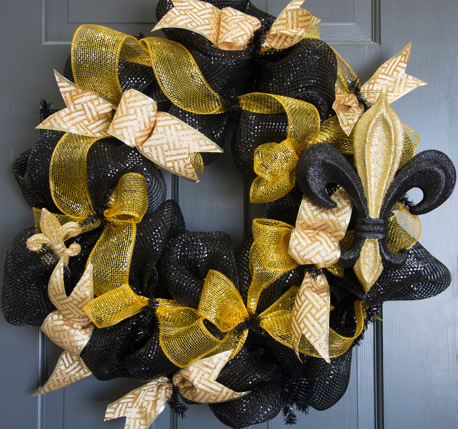 10" Fleur de Lis Ornament: Black & Gold Glitter Lifestyle Photo