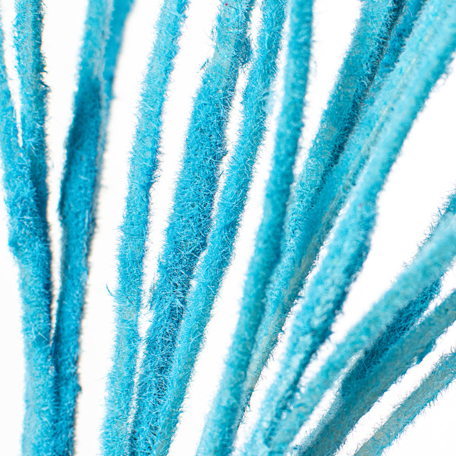 27" Flocked Grass Bush: Blue Lifestyle Photo