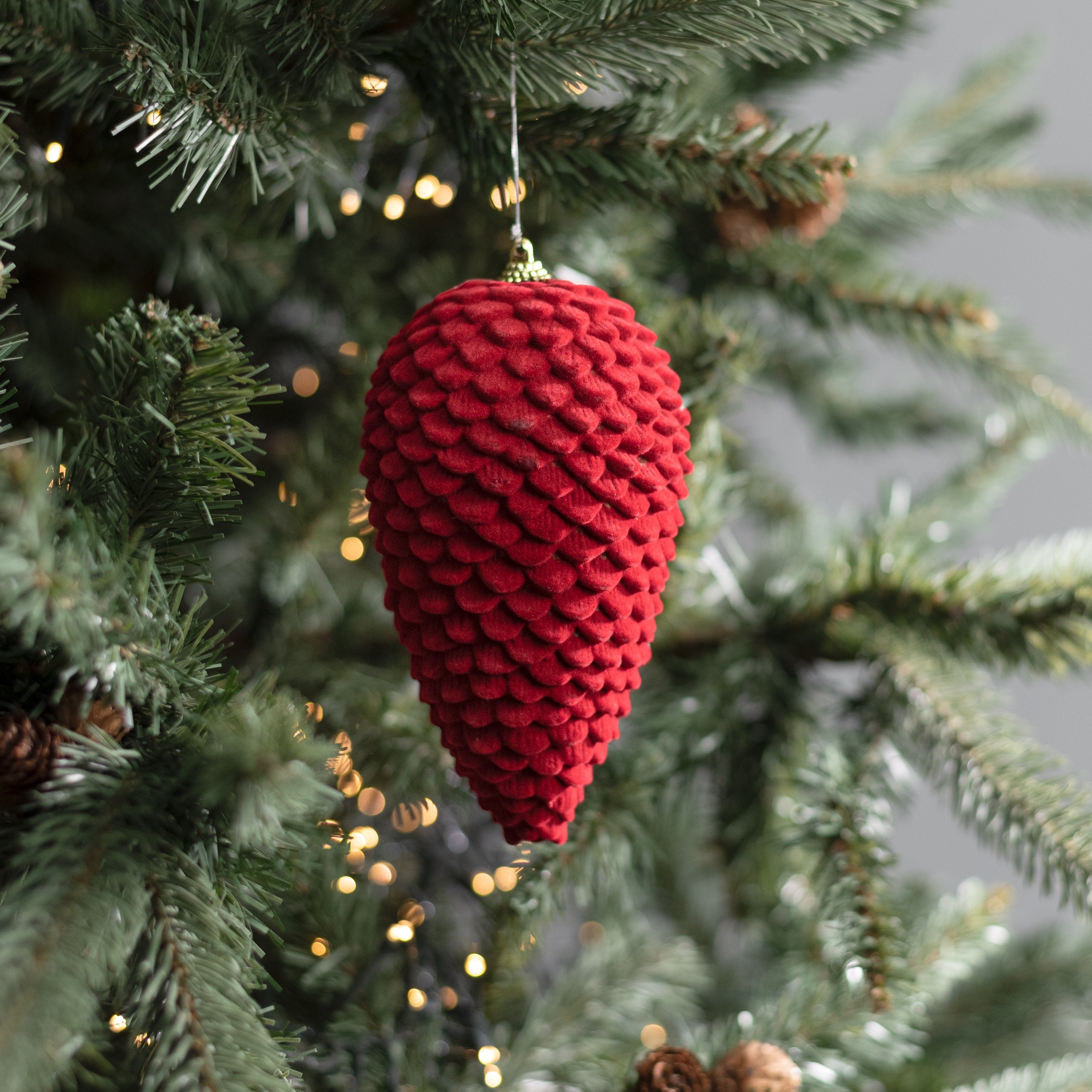 6" Flocked Pinecone Ornament: Red Lifestyle Photo