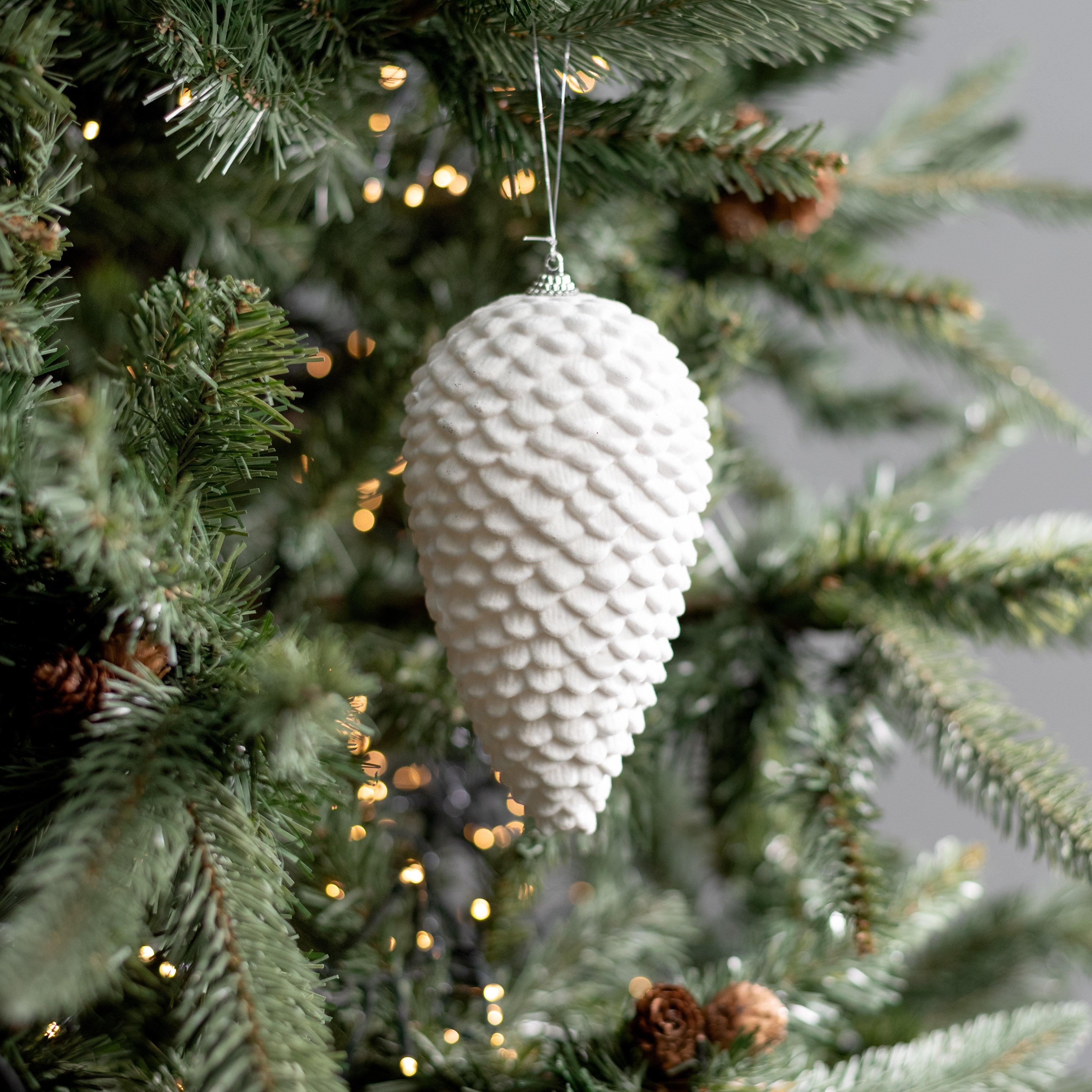 6" Flocked Pinecone Ornament: White Lifestyle Photo