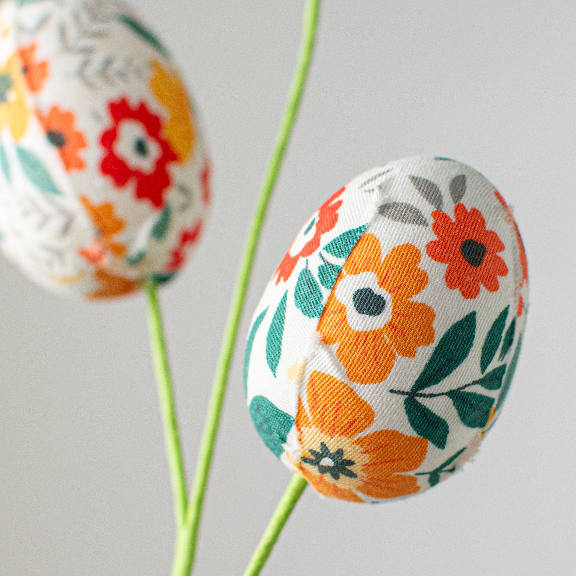 29" Floral Print Easter Egg Spray: Orange, Jade, Coral Lifestyle Photo